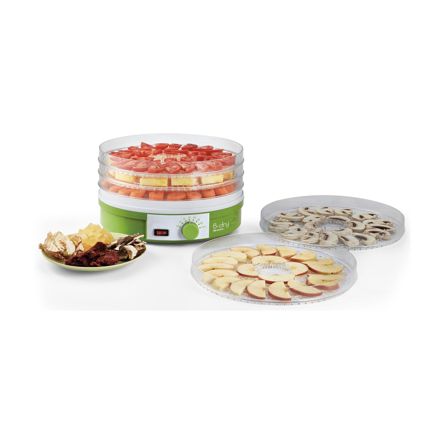 Essiccatore verde con vassoi impilati con pomodori e frutta, oltre a vassoi separati con mele e funghi.