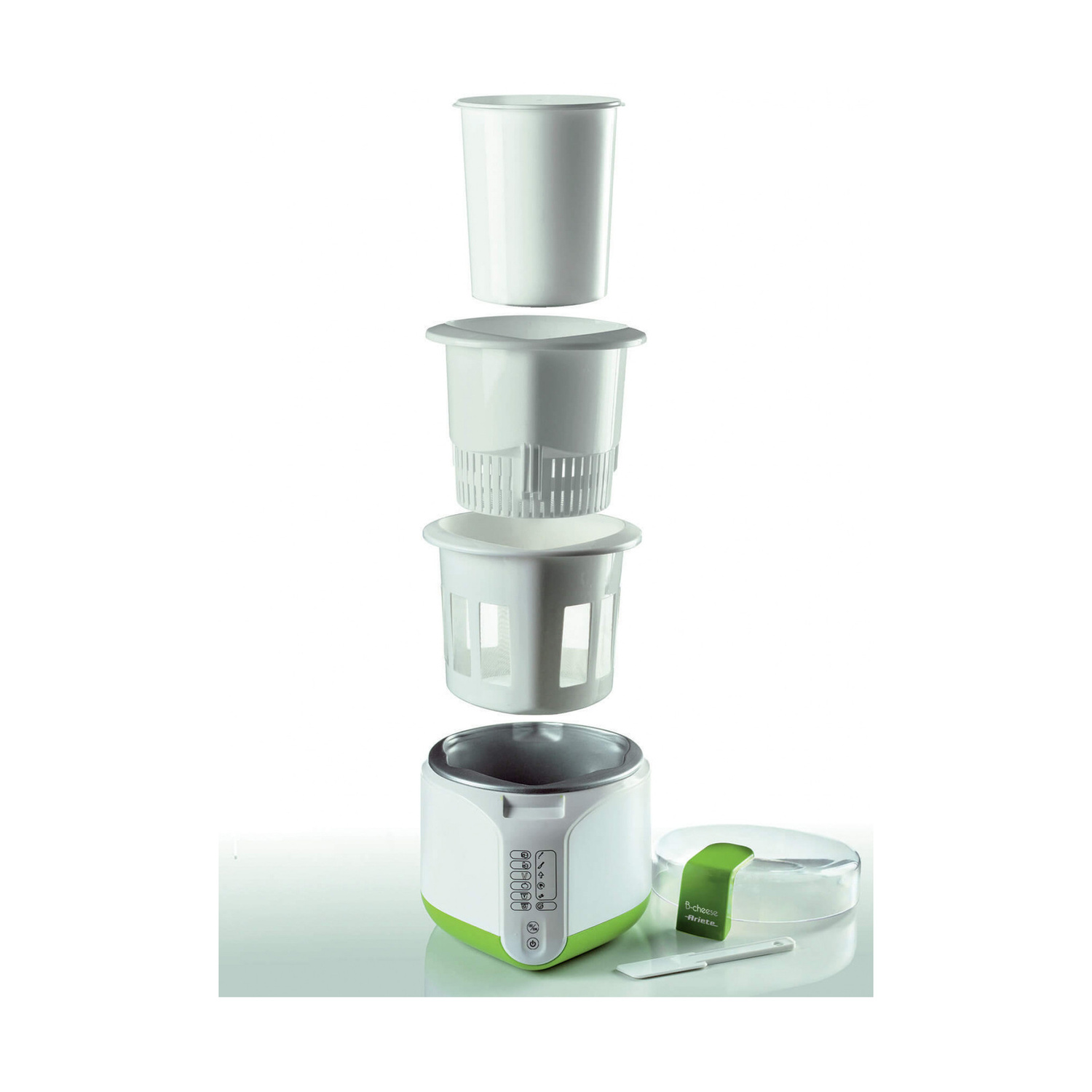 Una yogurtiera bianca con base verde, contenitori impilati, coperchio trasparente e una spatola.