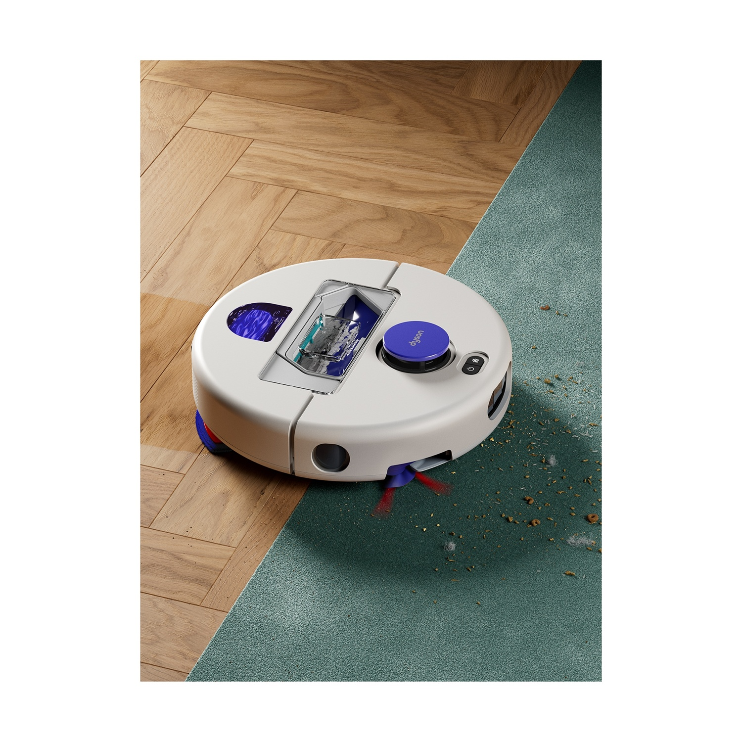 Un robot aspirapolvere bianco e viola pulisce un tappeto vicino al parquet.