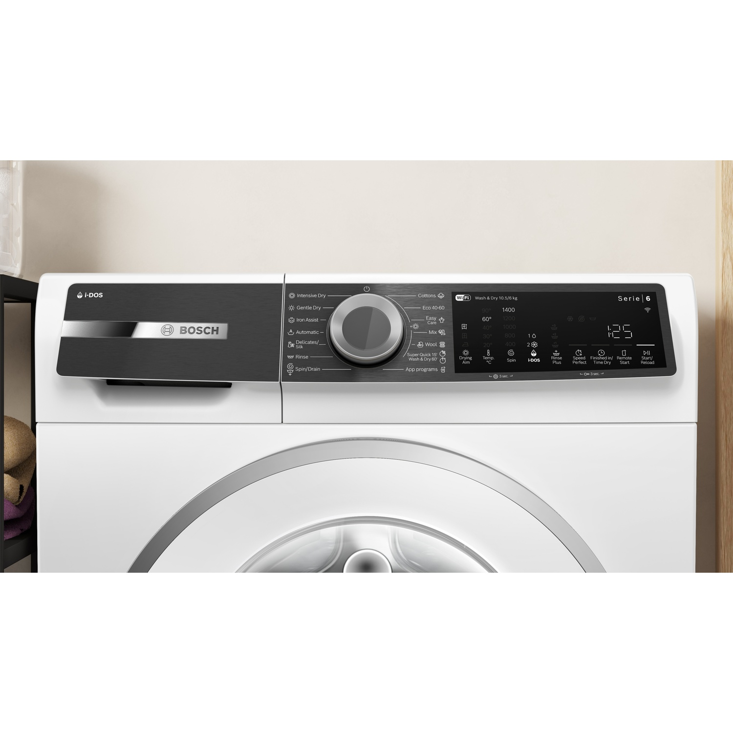 Close-up van een wit Bosch wasmachine bedieningspaneel met draaiknop en display.