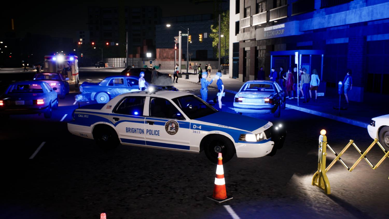 Escena callejera nocturna con un coche de policía de Brighton, personal de emergencia y transeúntes.