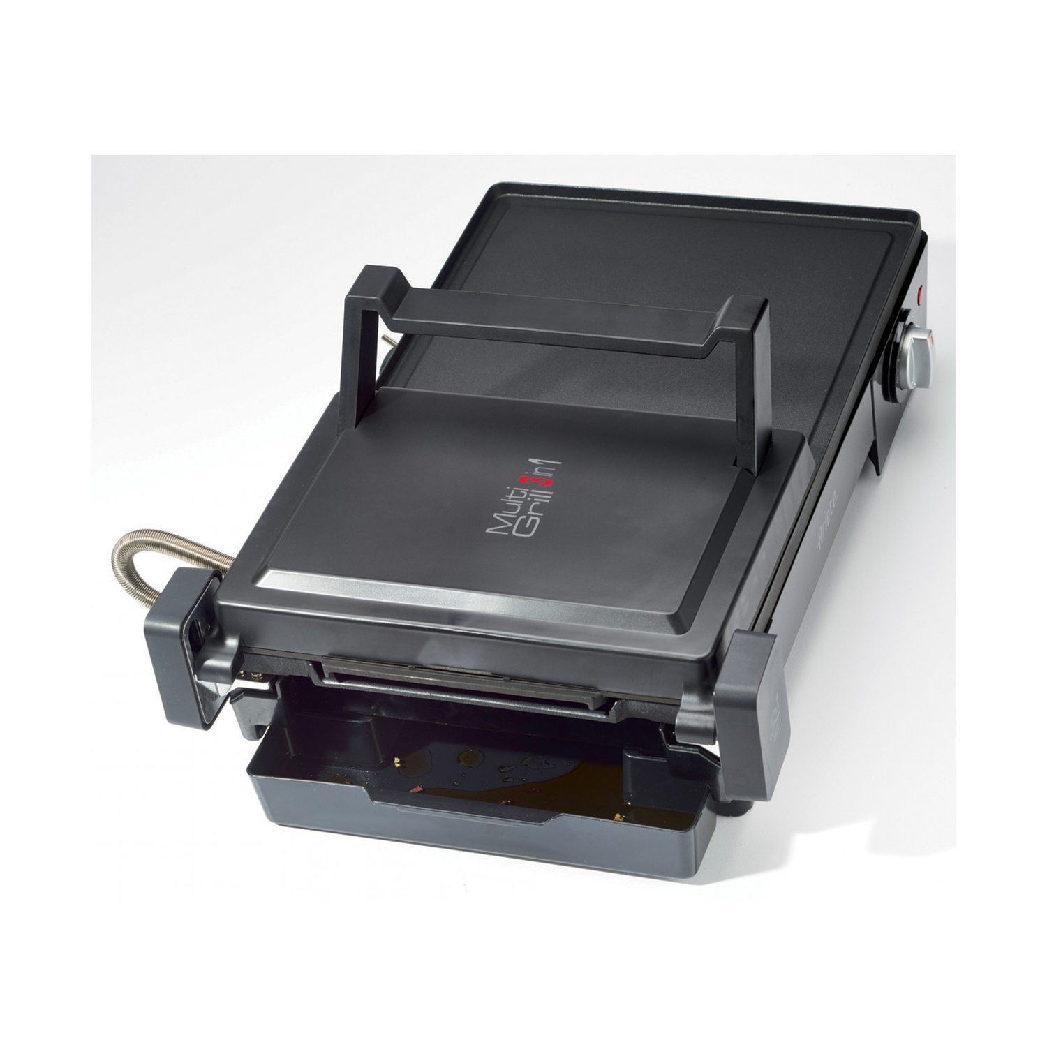 Multigrill elettrico nero con piastra chiusa e vassoio raccogligocce estraibile.
