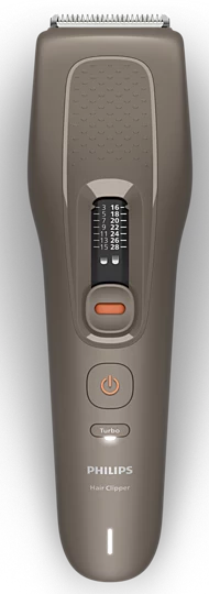 Brauner Philips Haarschneider mit Längeneinstellrad, Ein-Aus-Taste und Turbo-Modus vor schwarzem Hintergrund.