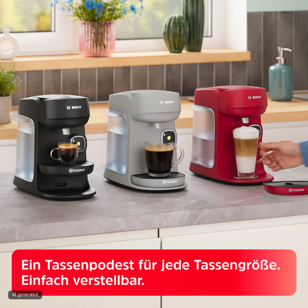 Drei Bosch Tassimo Kaffeemaschinen in Schwarz, Grau und Rot auf einer Arbeitsplatte in einer Küche.