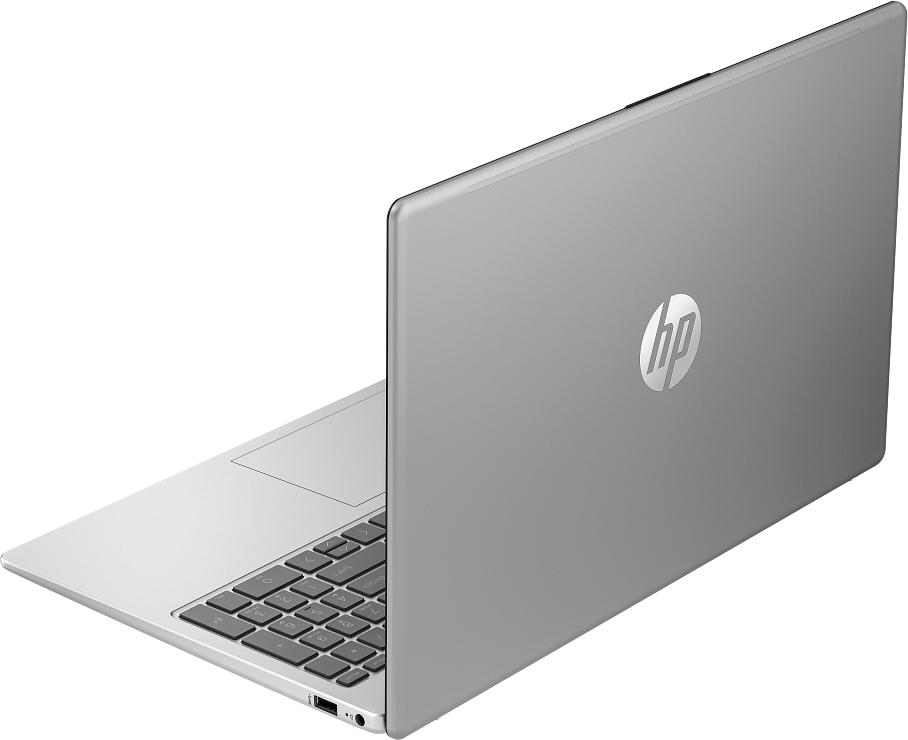 Egy ezüst HP laptop fekete háttér előtt, részben látható billentyűzettel.