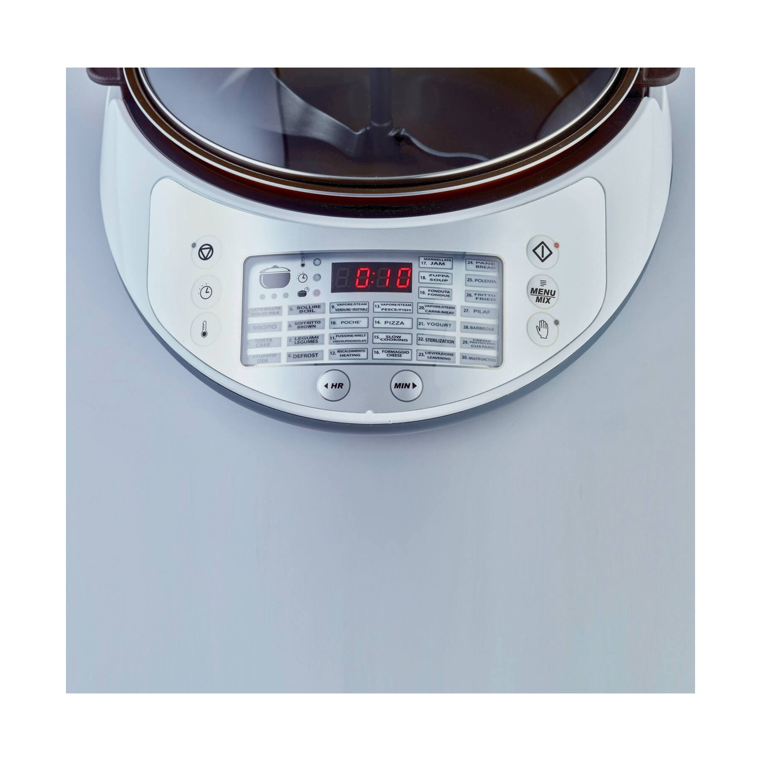 Vista dall'alto del pannello frontale di un multicooker bianco con display e pulsanti.