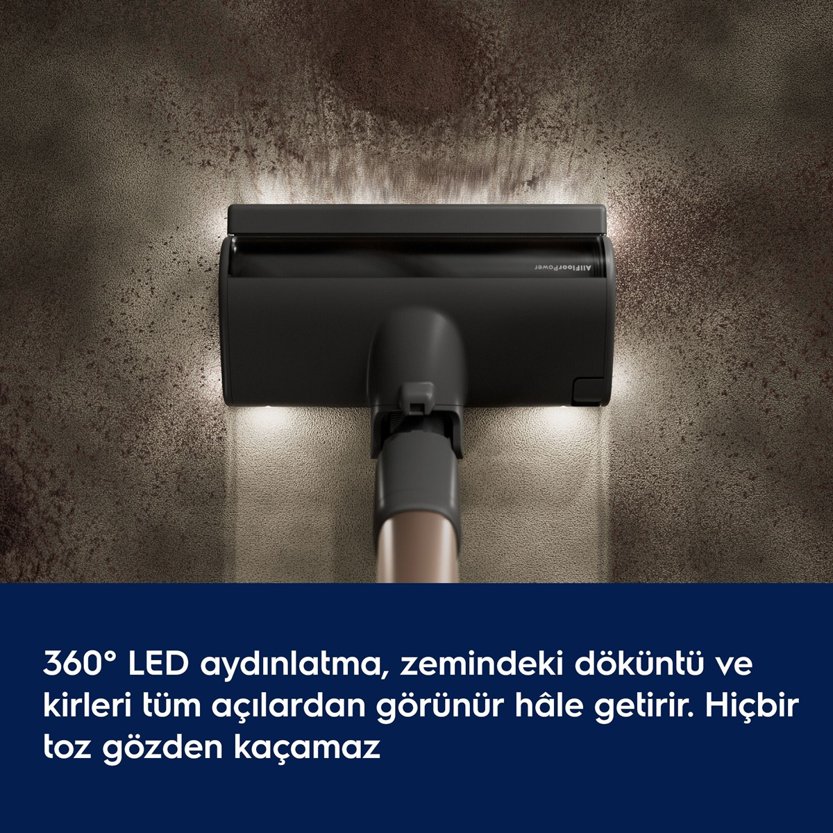 Parlak LED'lere sahip süpürge başlığı kirli halı zeminini aydınlatıyor.