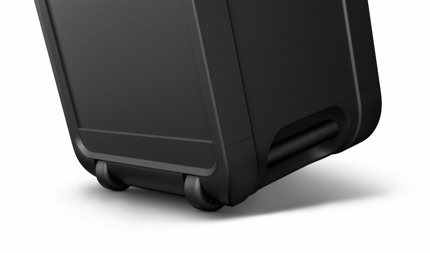 Bottom of a black case with two small wheels and an integrated handle against a white background.