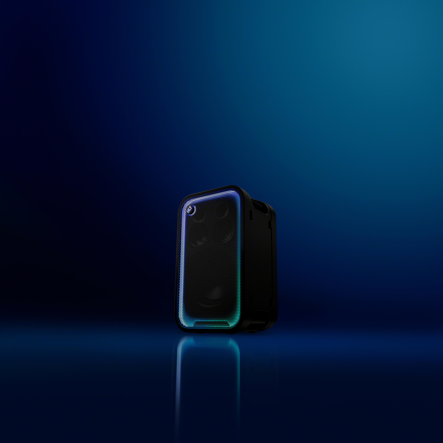 A black portable speaker with blue and green LED lighting stands on a reflective blue surface.