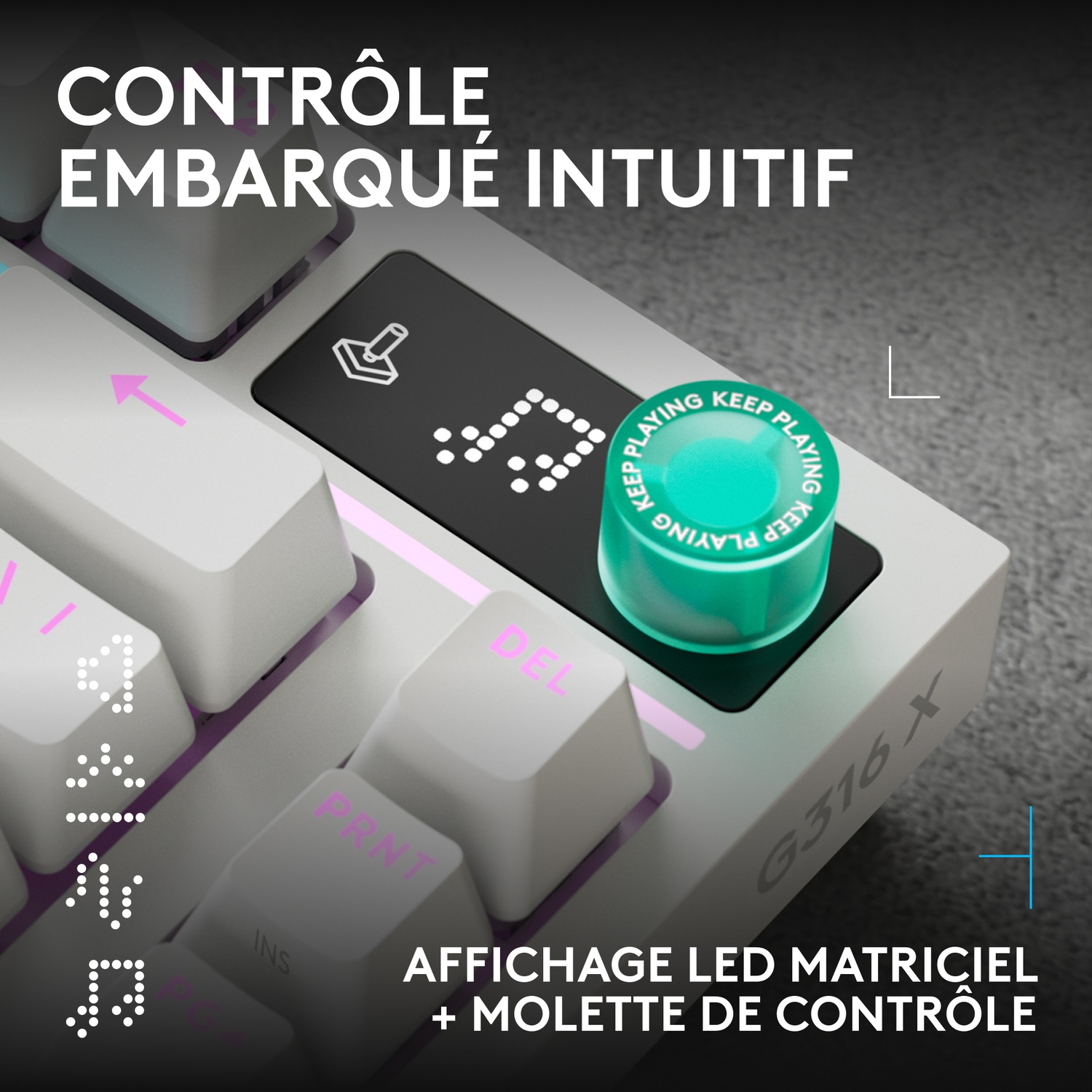 Gros plan d'un clavier de jeu doté d'un écran à matrice LED et d'une molette de commande vert vif.