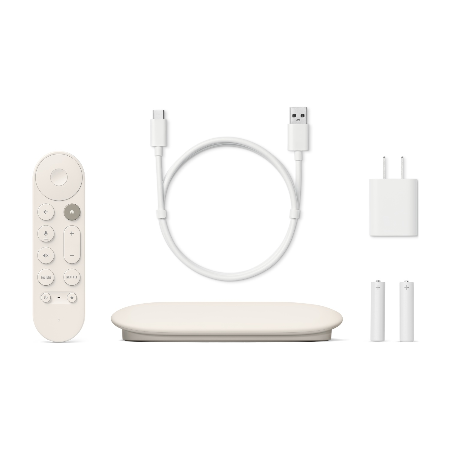 Dispositivo di streaming bianco con telecomando, cavo, alimentatore e batterie.