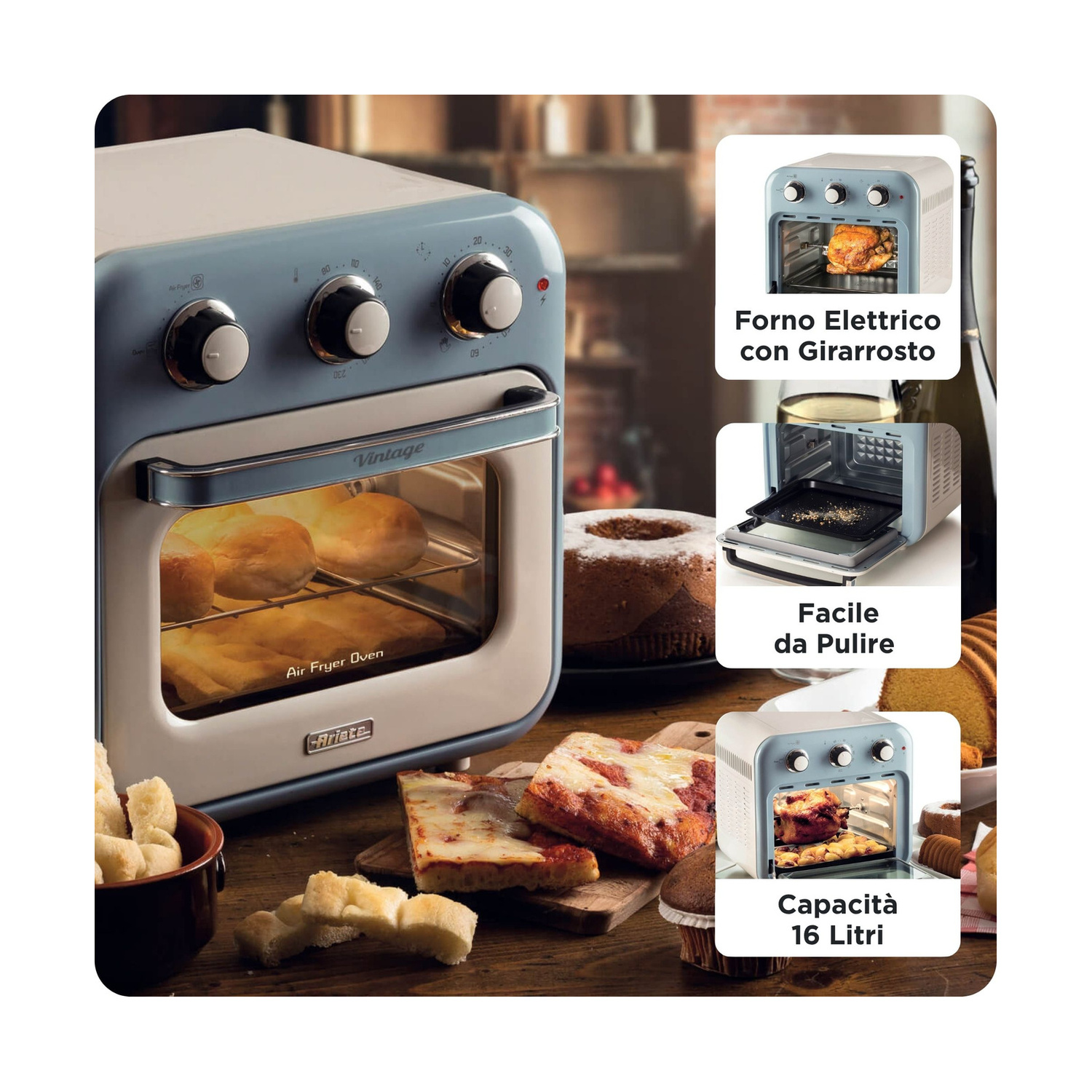 Un forno ad aria vintage blu su un tavolo di legno, circondato da fette di pizza, pane e torta.
