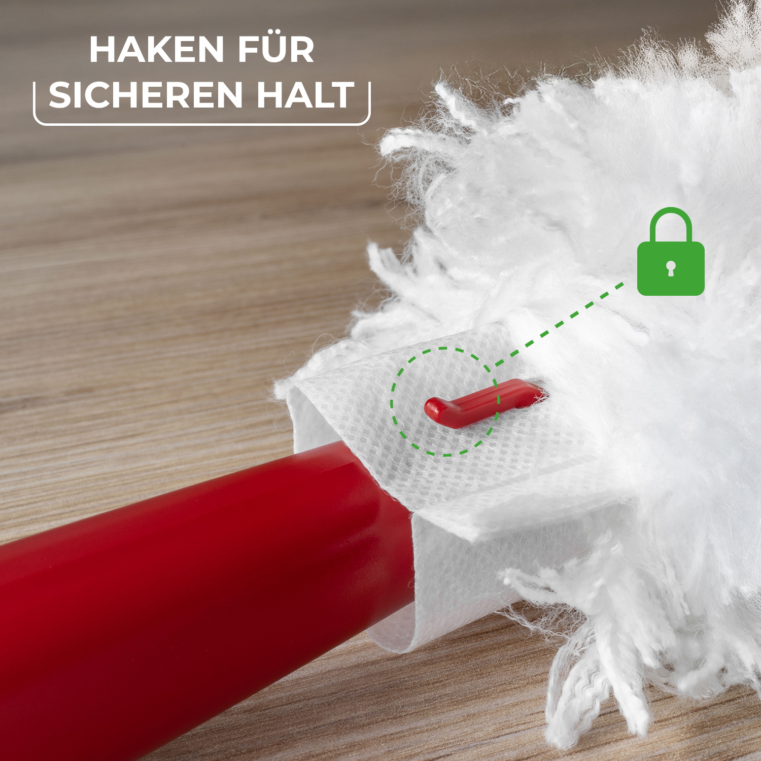 Close-up of a white duster with a red handle and a locking hook mechanism for secure grip.