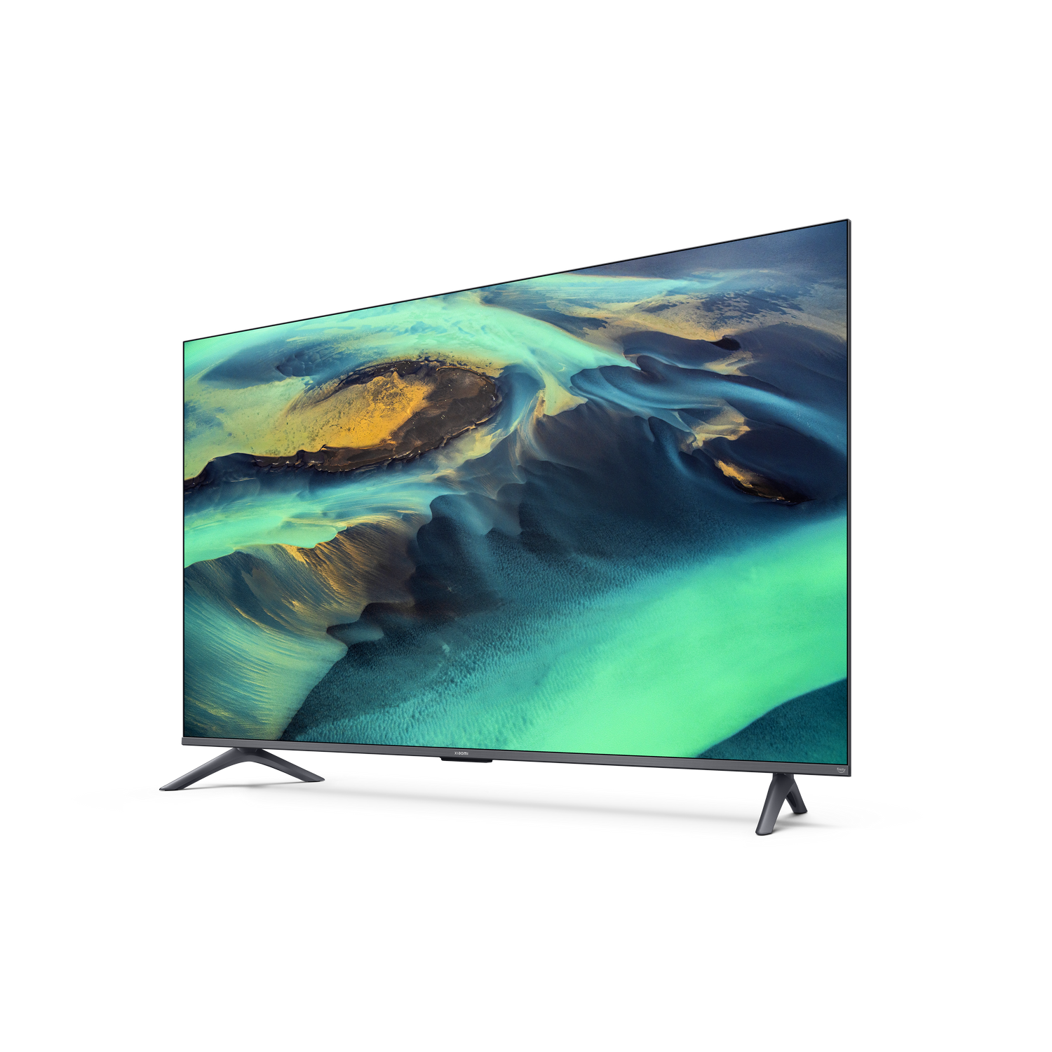Un televisor de pantalla plana moderno sobre fondo negro, mostrando un paisaje abstracto vibrante con tonos azules y amarillos.