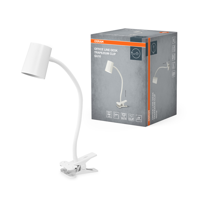 Egy fehér Osram Trapezium Clip asztali lámpa áll a nyomtatott termékcsomagolása mellett.