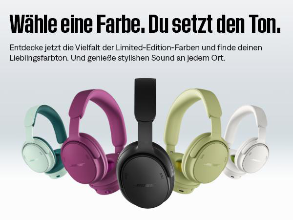 Fünf Bose-Kopfhörer in verschiedenen Limited-Edition-Farben stehen nebeneinander vor einem hellen Hintergrund.