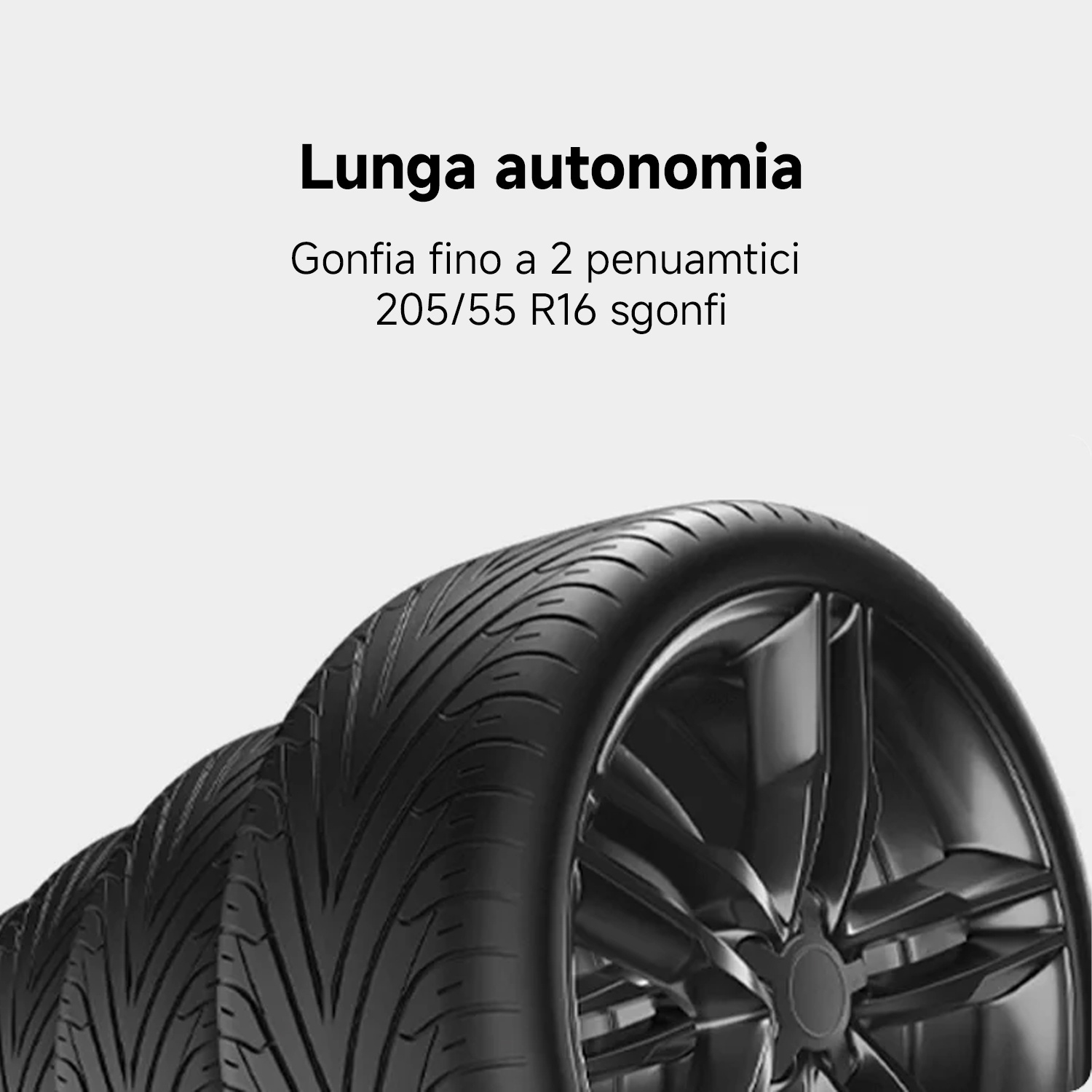 Uno pneumatico auto nero con battistrada su sfondo chiaro, con testo in italiano sopra.