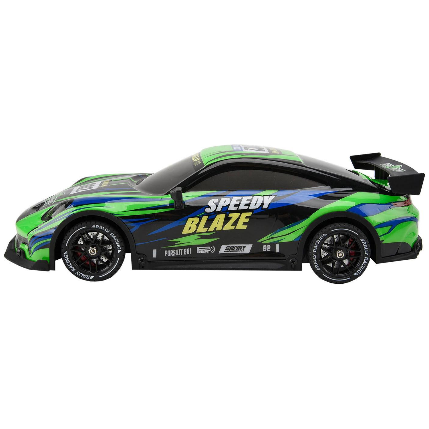 A black, green, and blue toy race car with Speedy Blaze decals on the side, viewed from the side.