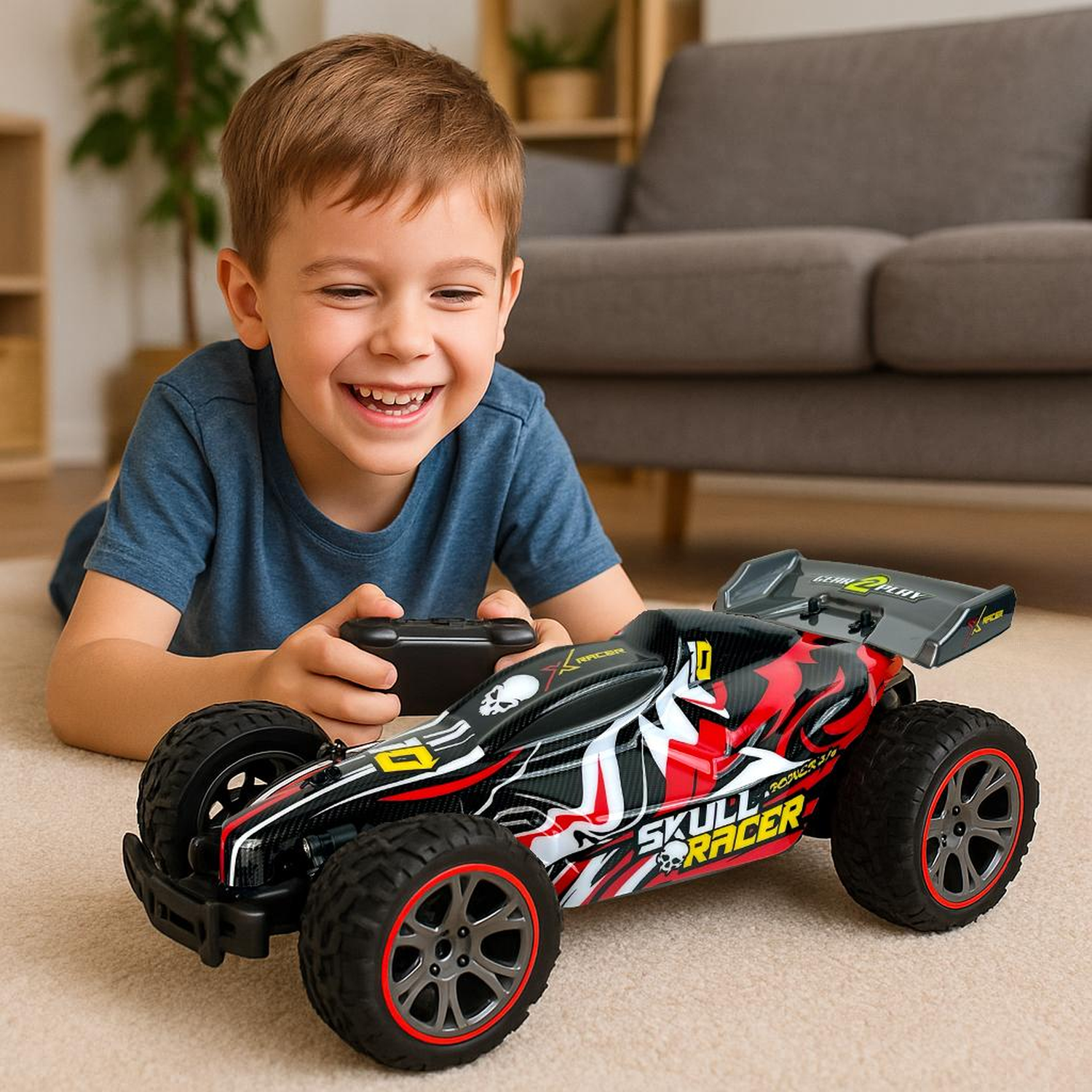 A happy boy lies on the carpet, controlling a remote-controlled car in a living room.