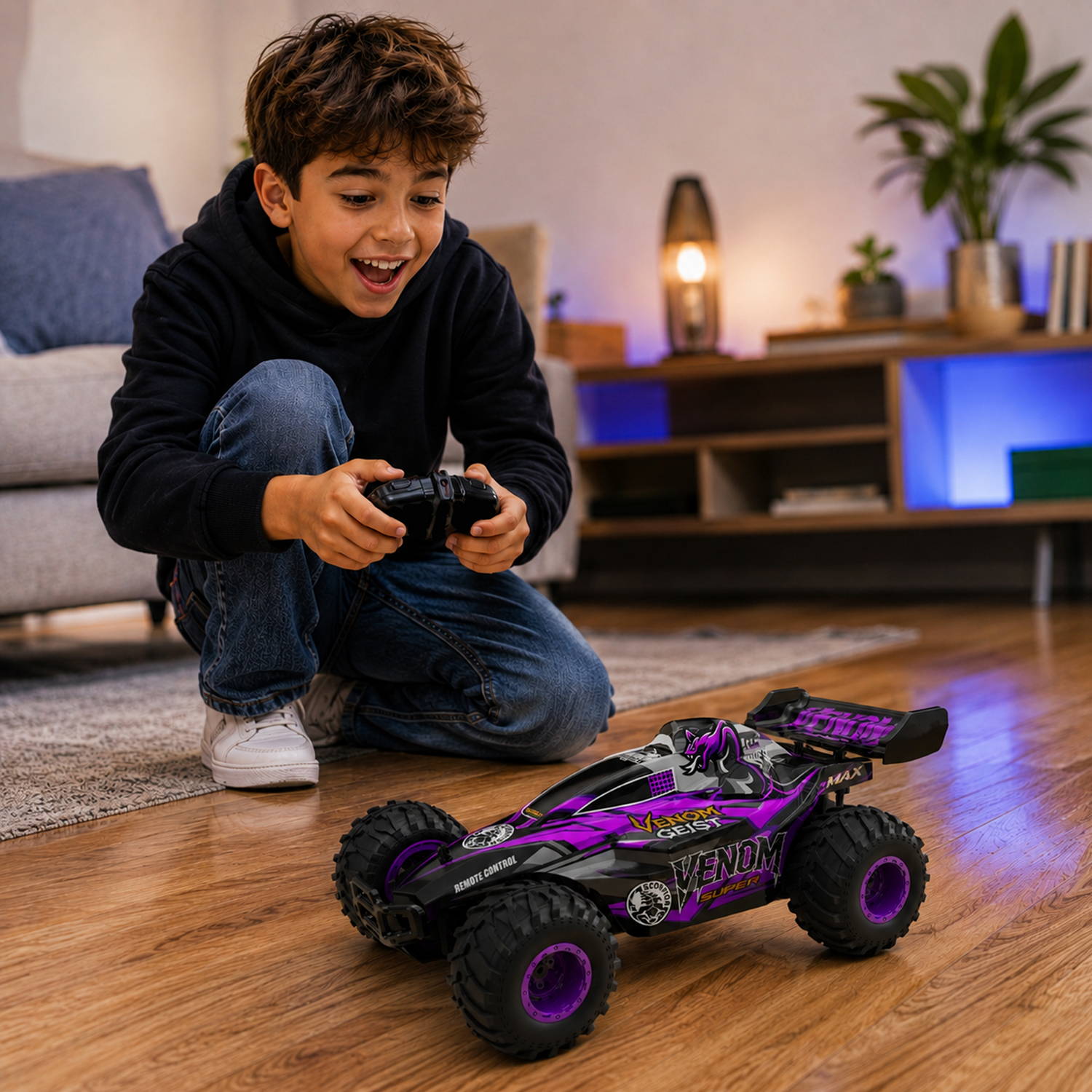 A boy kneels on a wooden floor, excitedly operating a black and purple remote-controlled car.