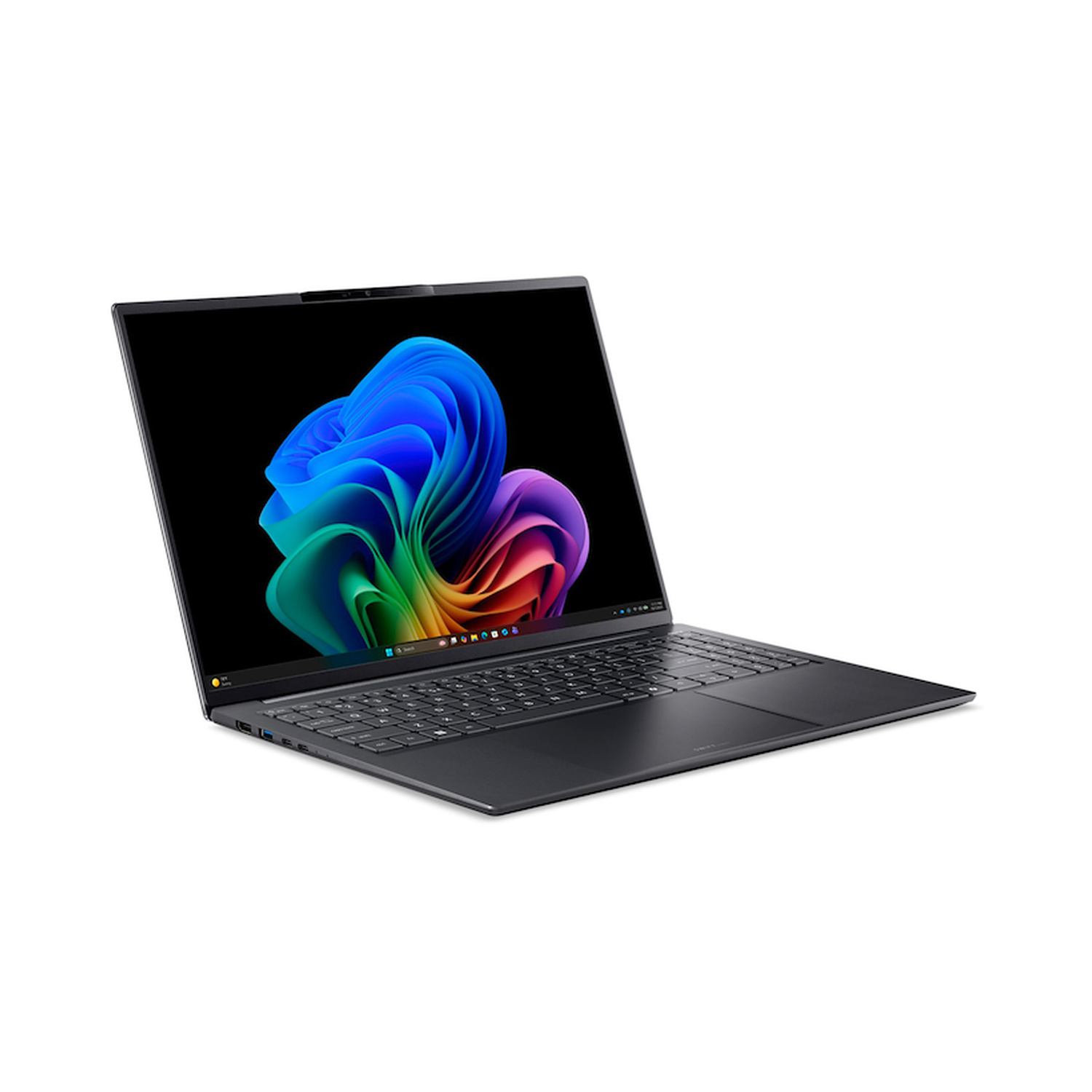 Un elegante laptop grigio mostra uno sfondo colorato e astratto a forma di fiore.