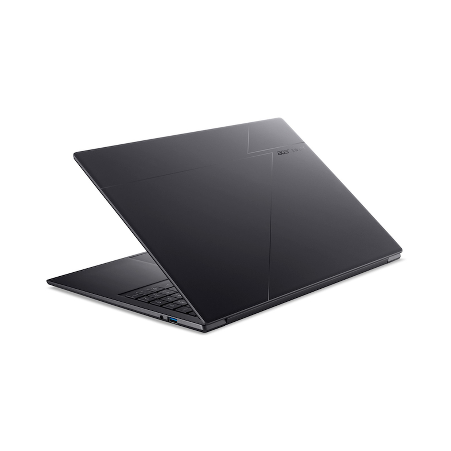 Un laptop Acer Swift nero chiuso su una superficie bianca, che mostra il suo design elegante e le porte laterali.