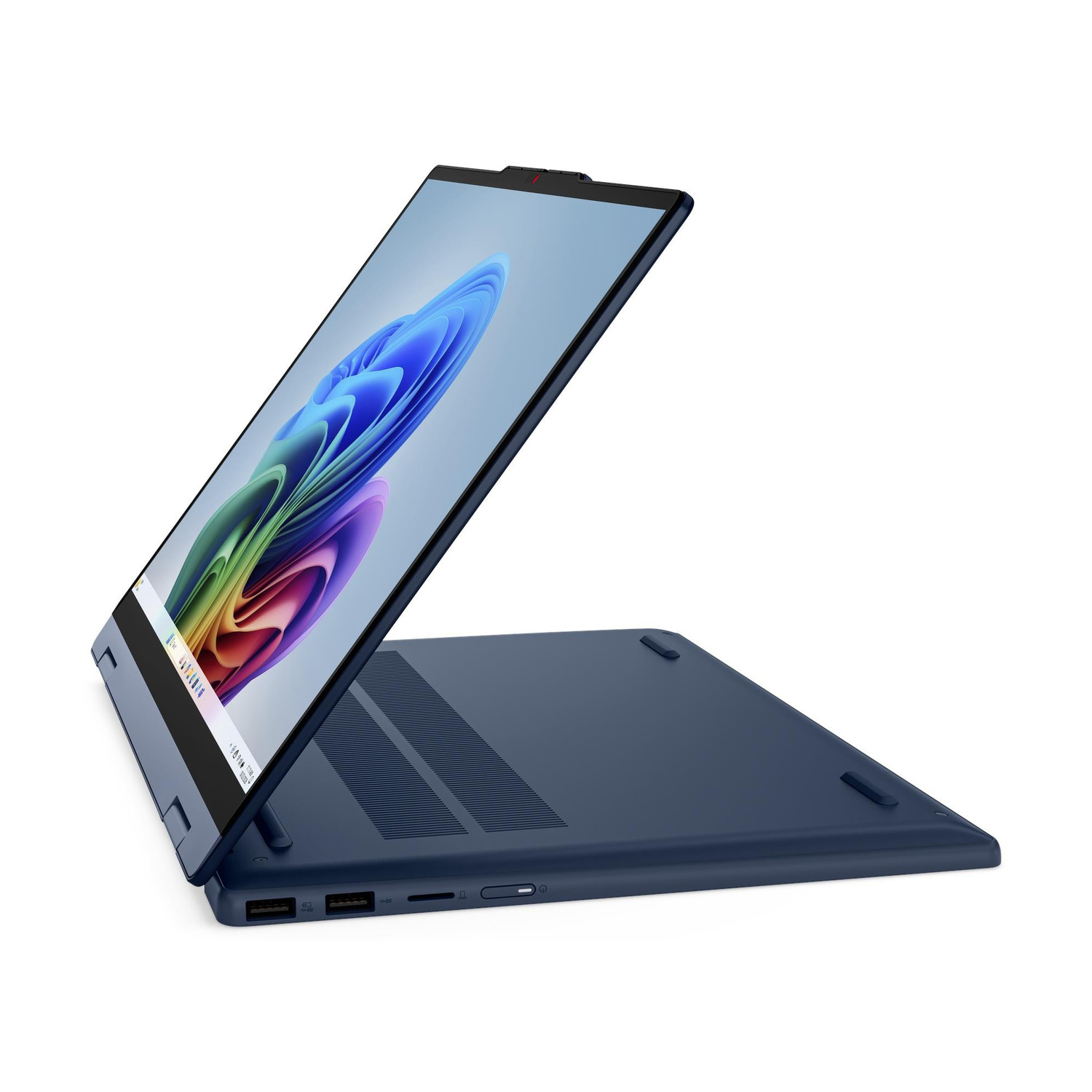 Un computer portatile blu su sfondo bianco, lo schermo mostra un design colorato.