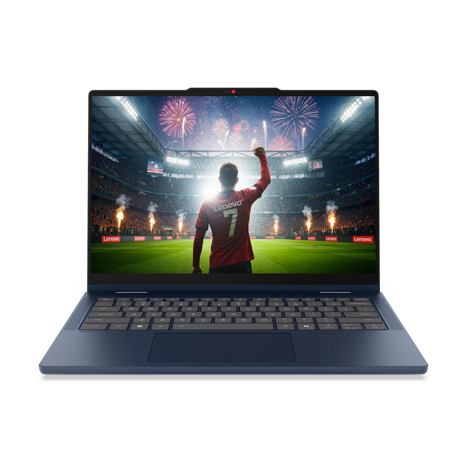 Un laptop blu mostra un calciatore in uno stadio con fuochi d'artificio sullo schermo.