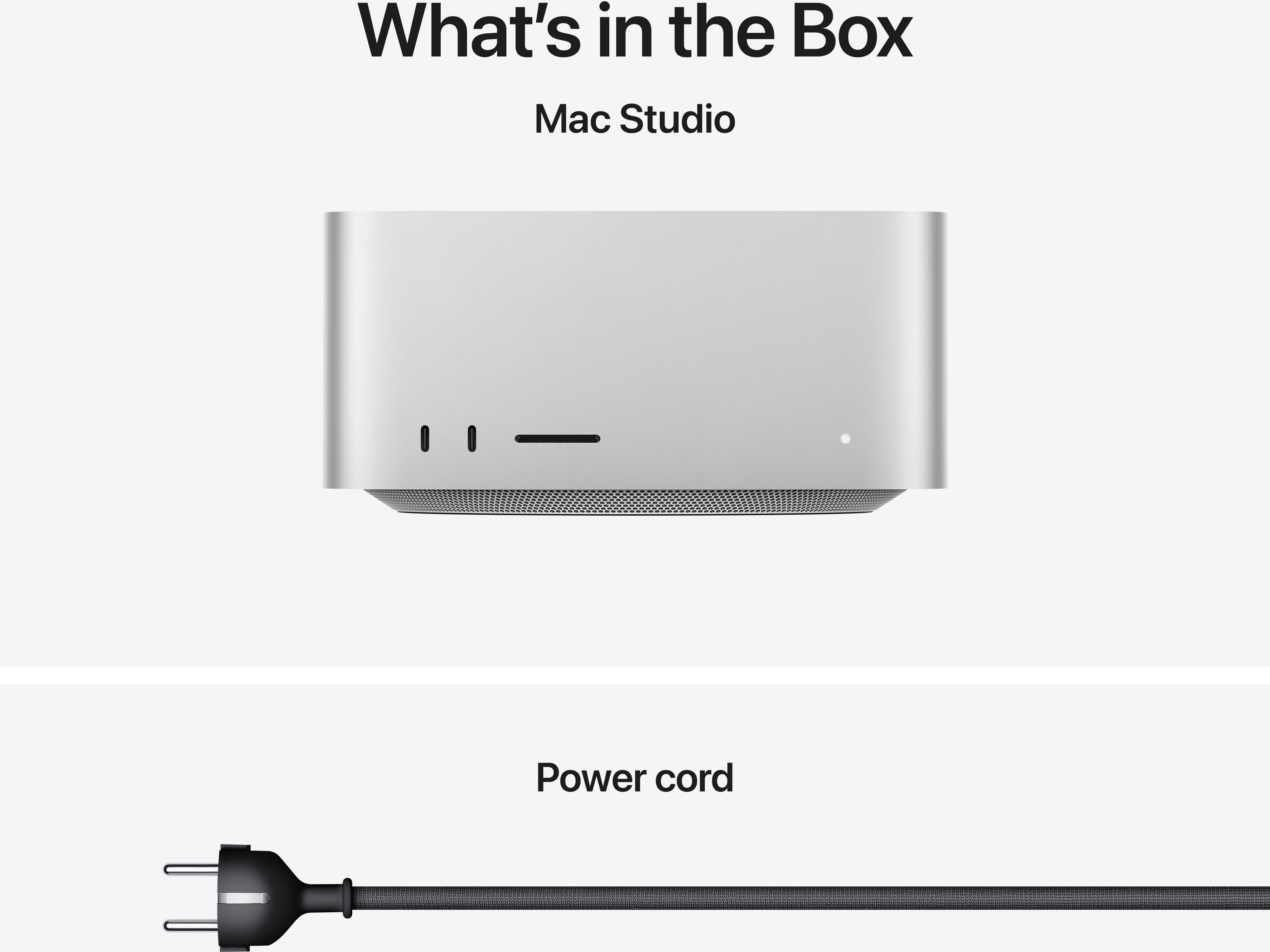 Mac Studio és egy fekete tápkábel világos háttéren.