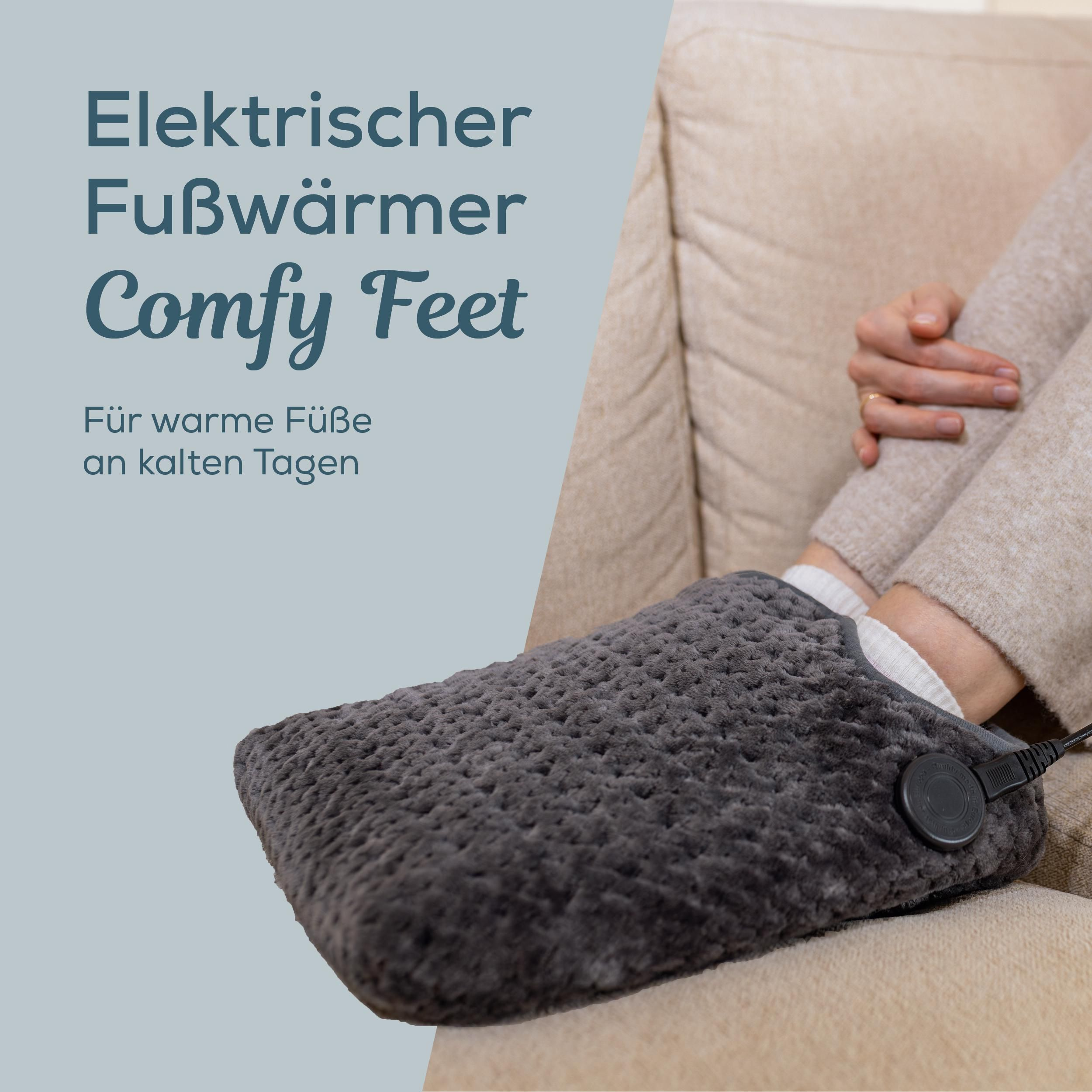 Ein grauer, flauschiger elektrischer Fußwärmer mit Texten auf einem blauen Banner.