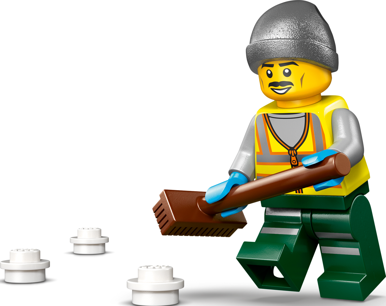Minifigurine Lego en bonnet gris et gilet jaune balayant de petites briques blanches avec un balai sur fond noir.