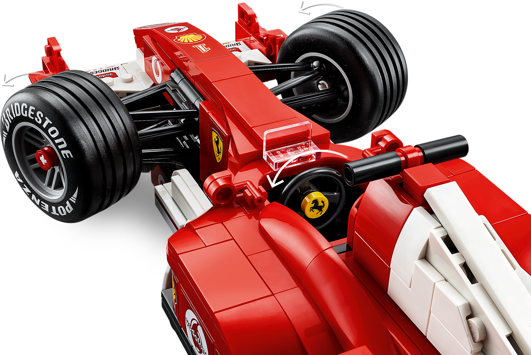 Nahaufnahme eines roten LEGO Formel-1-Rennwagens von oben gegen schwarzem Hintergrund.