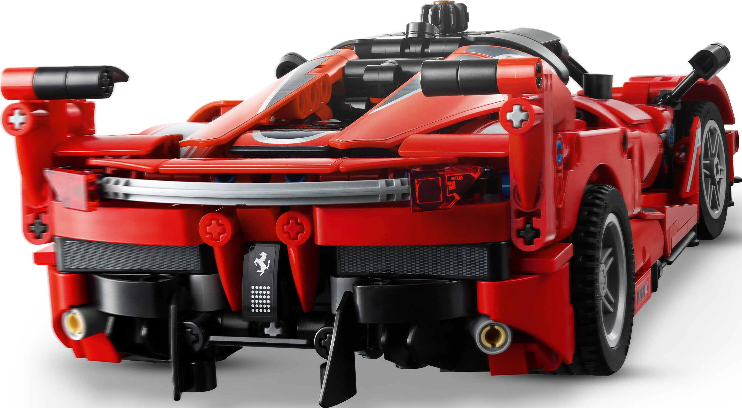 Voiture modèle Lego Technic Ferrari rouge vue de dos, montrant les détails comme l'échappement et les feux arrière.