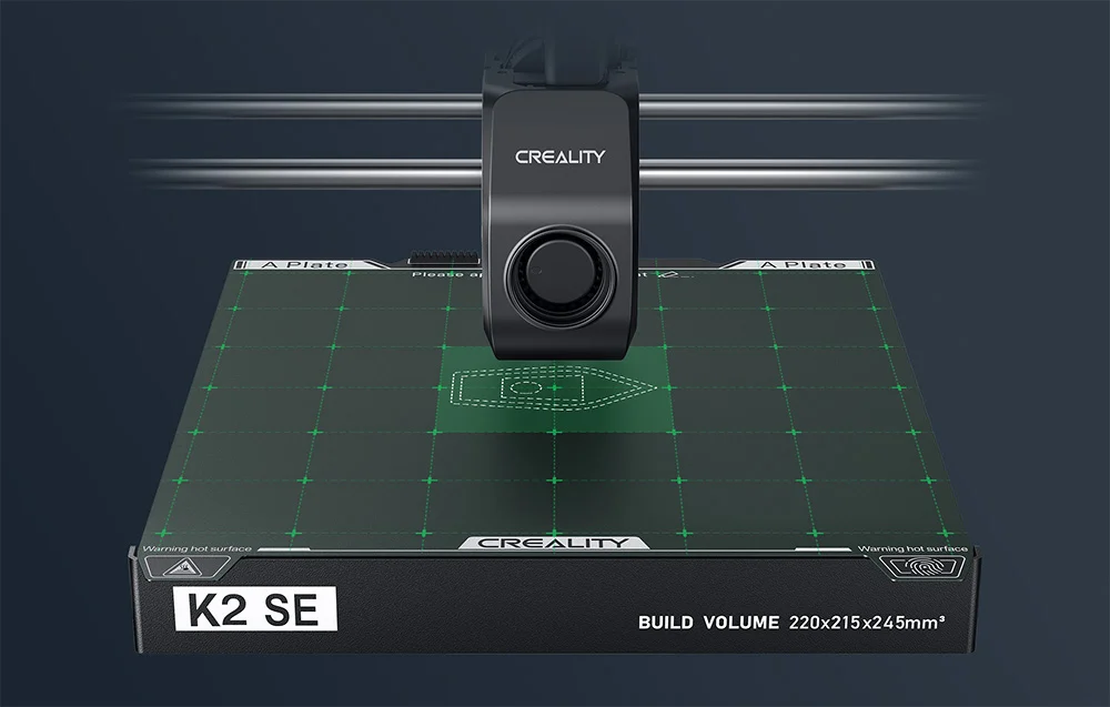 Creality K2 SE 3D nyomtató fekete házzal, nyomtatási ággyal és igazítórccsal.