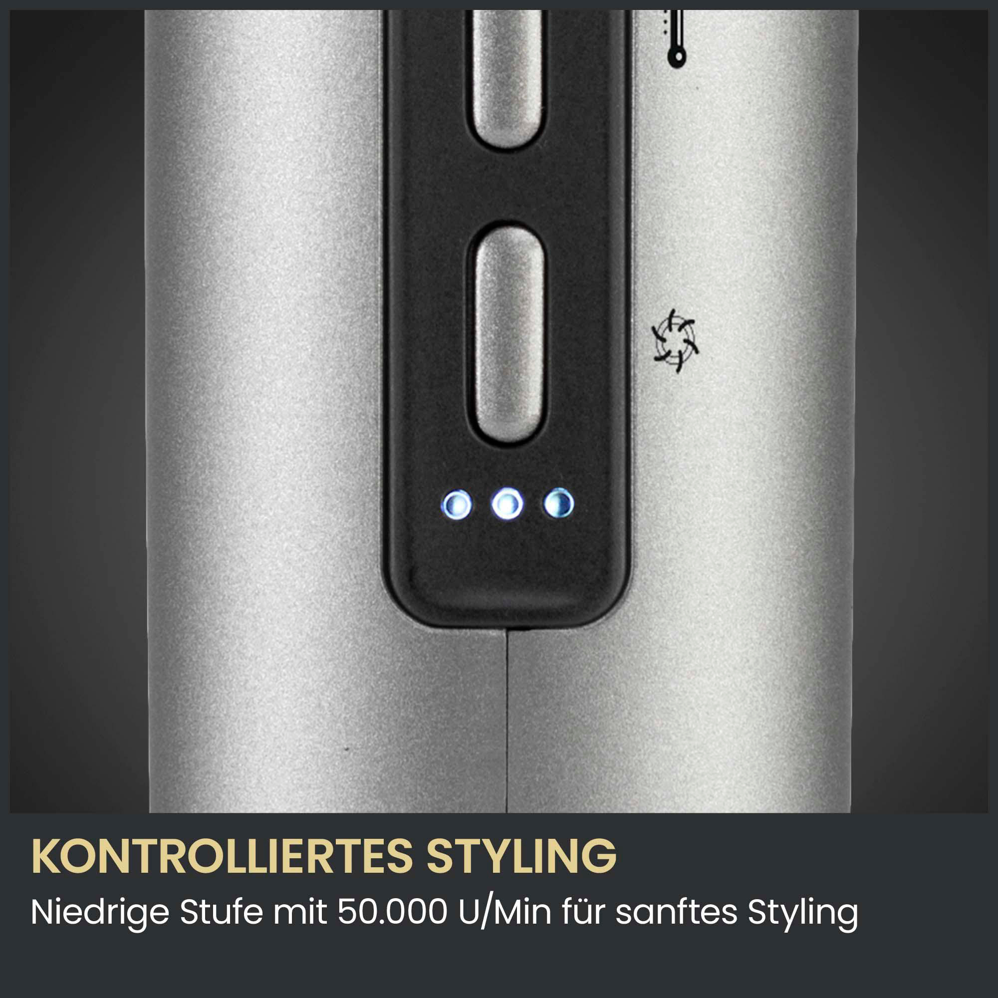 Graues Haargerät mit Knöpfen und LEDs auf schwarzem Bedienfeld, Text: KONTROLLIERTES STYLING.