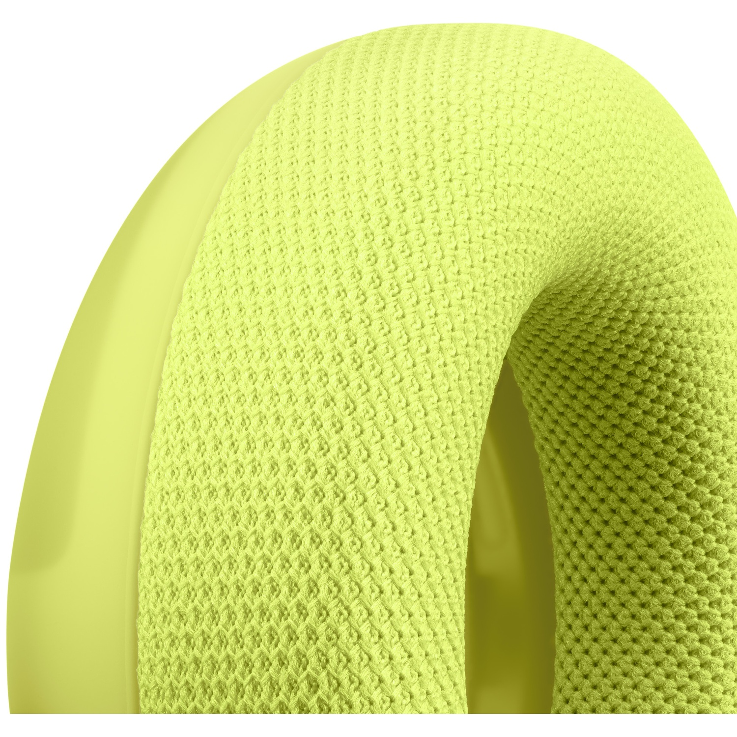 Gros plan d'un coussinet d'écouteur vert-jaune avec une surface en maille texturée.