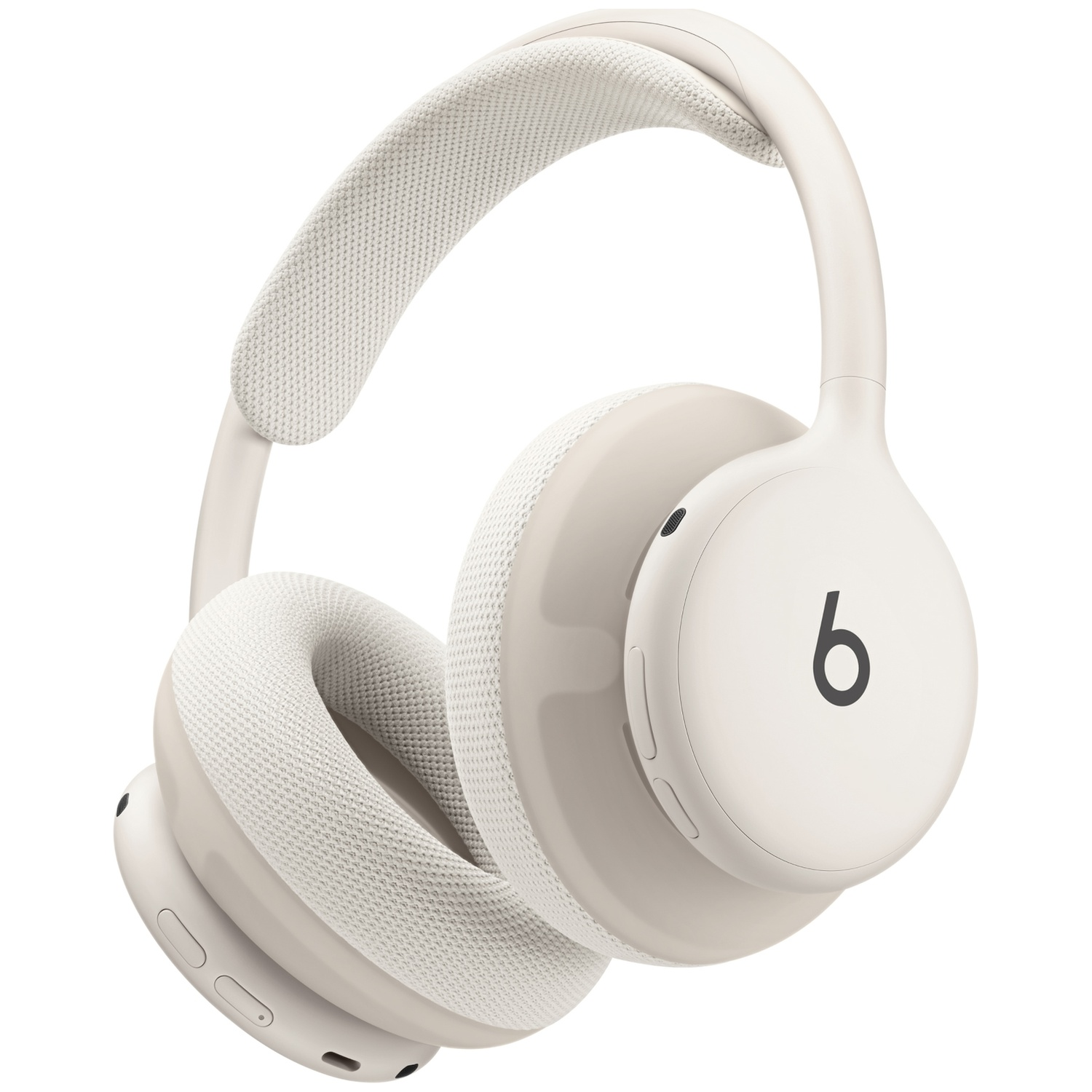 Casque supra-auriculaire sans fil beige avec le logo Beats sur l'oreillette sur fond blanc.
