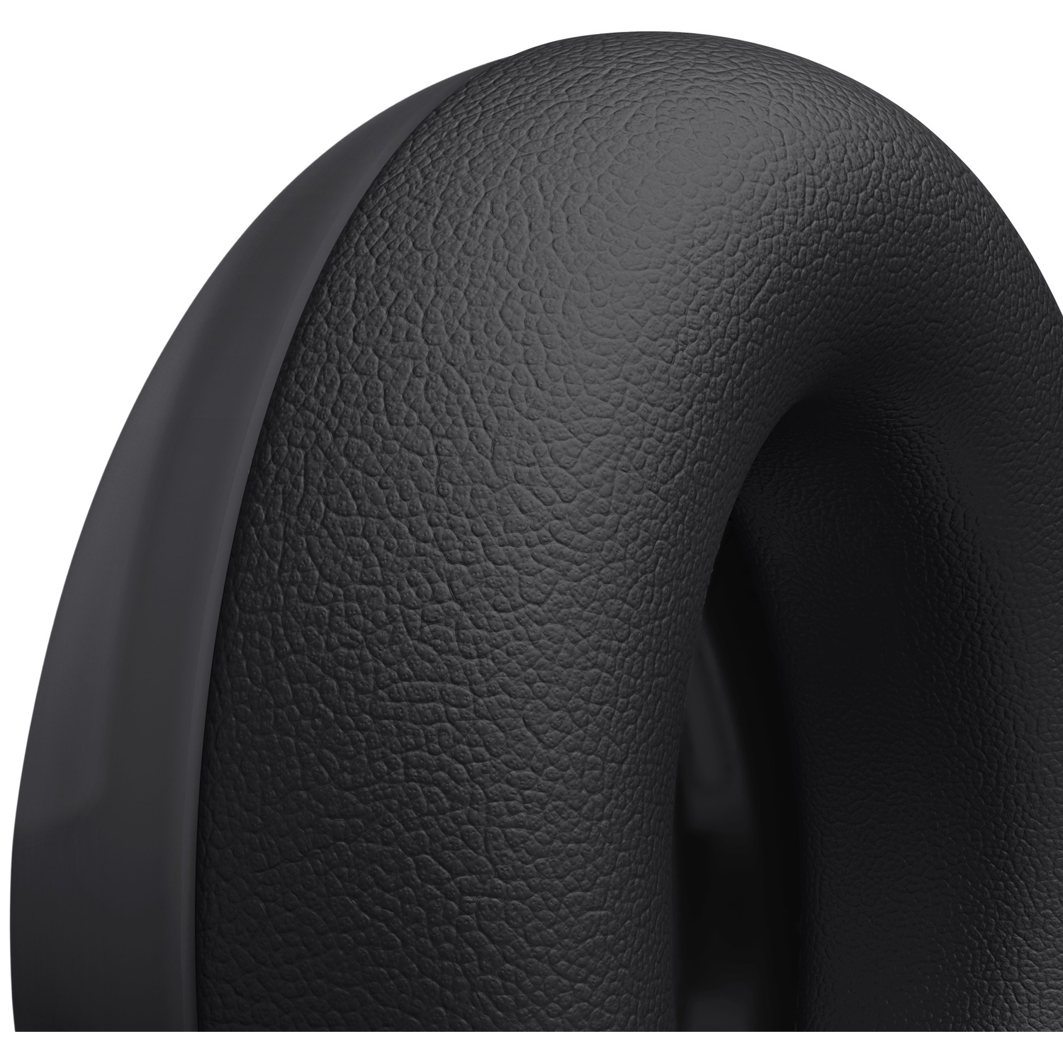 Gros plan d'un coussinet d'écouteur rembourré noir avec une surface texturée sur fond blanc.