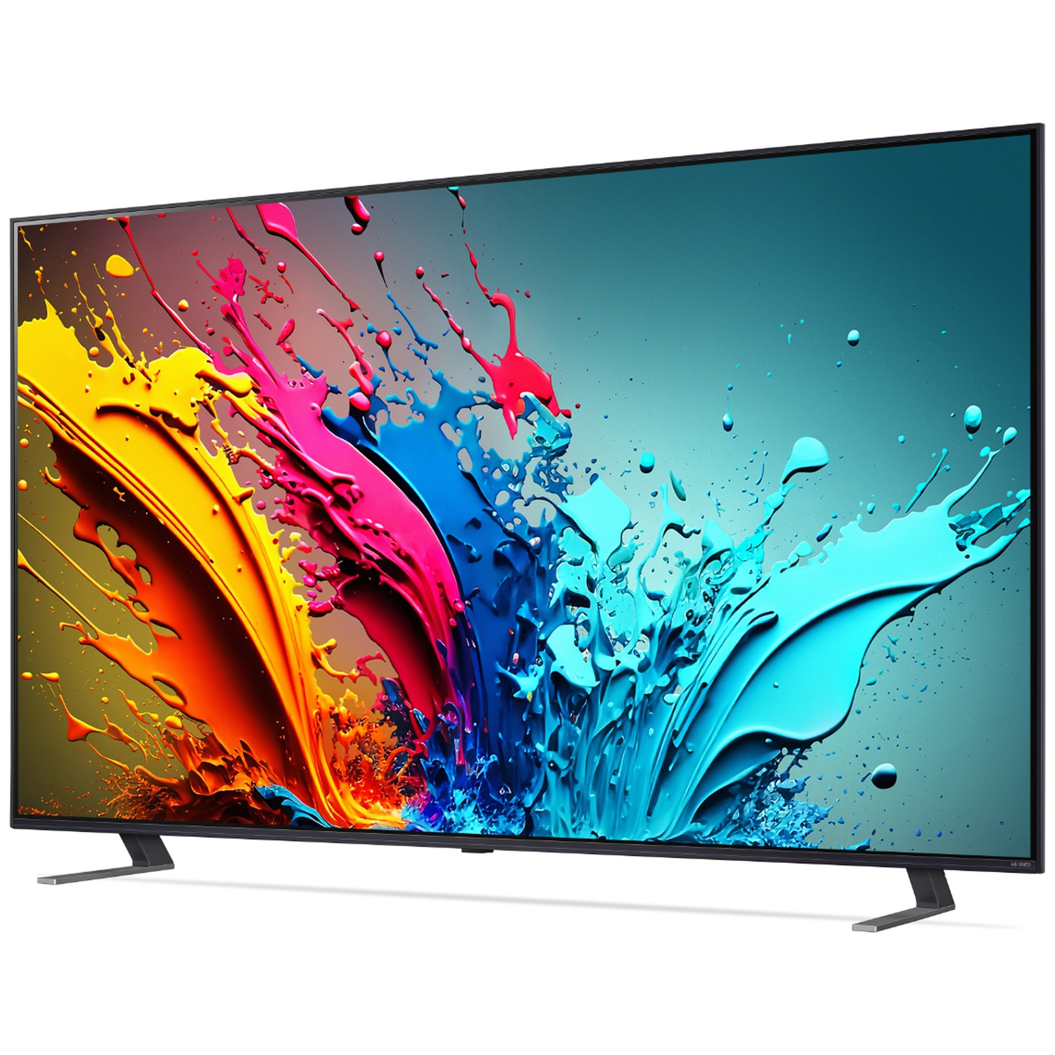 A slim-bezel TV displays a colorful splash of yellow, pink, blue, and turquoise paint on the screen.