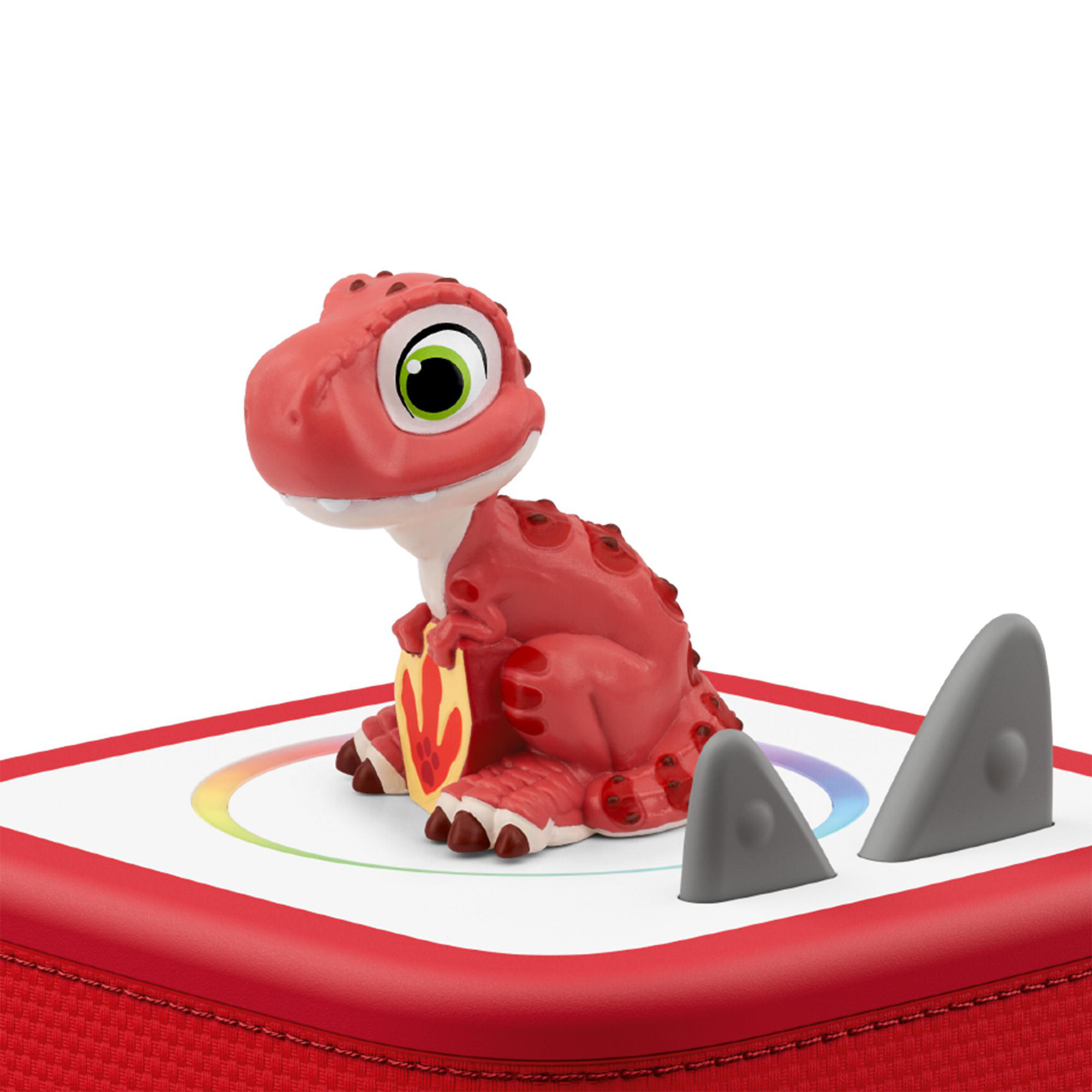 Roter Plüsch-Dinosaurier mit großen Augen auf einem bunten Quadrat.