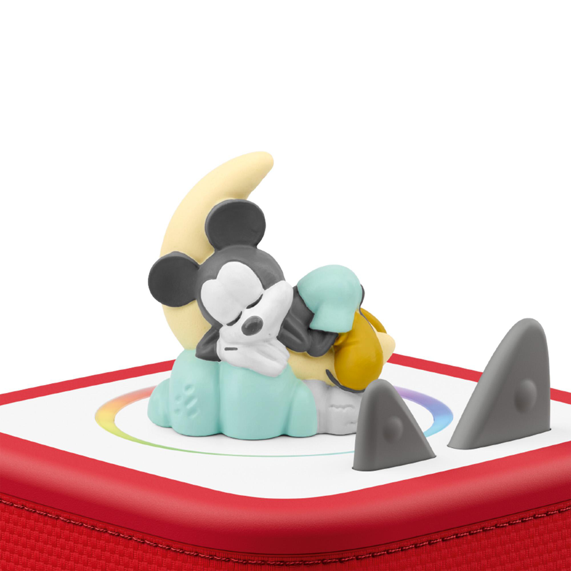 Eine Micky-Maus-Figur schläft auf einer Mondsichel auf einem rot-weißen Gerät.