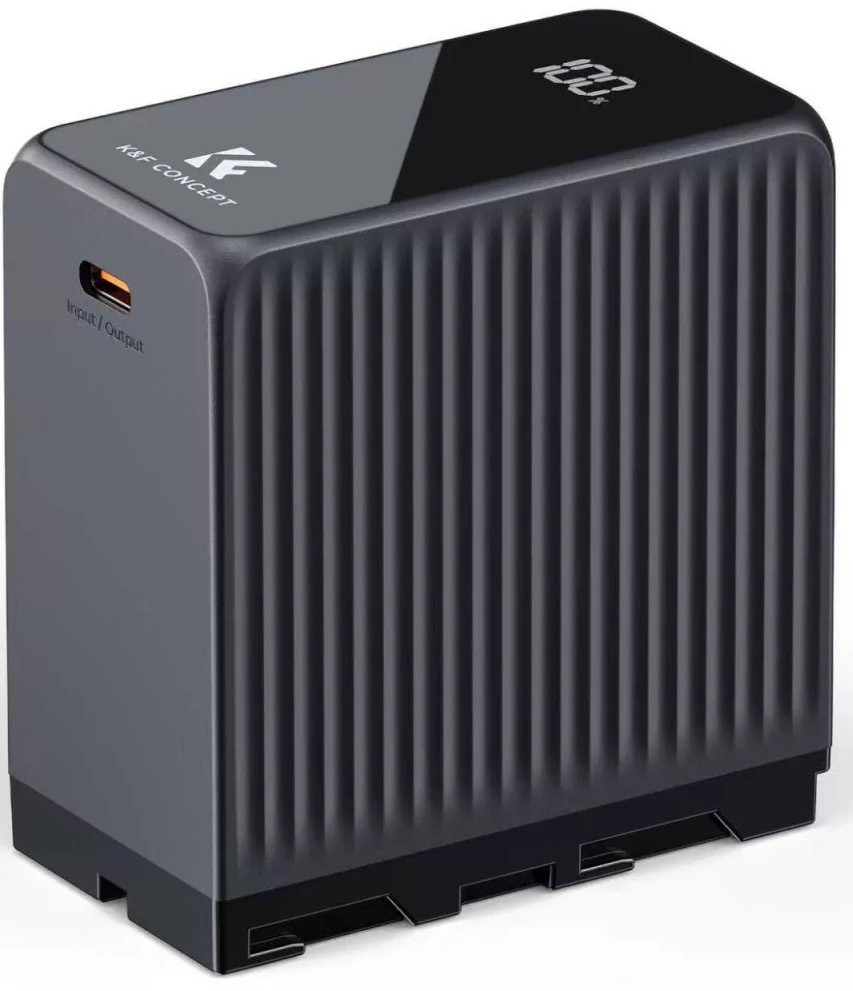 Szürke elektronikus töltő bordázott oldalakkal, felül digitális kijelzővel és elöl USB-C porttal.