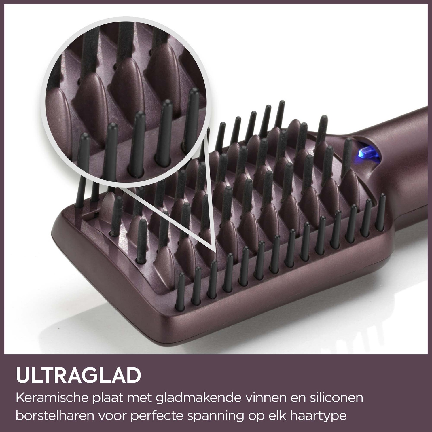 Close-up of a straightening hair brush with a ceramic plate and silicone-tipped bristles.