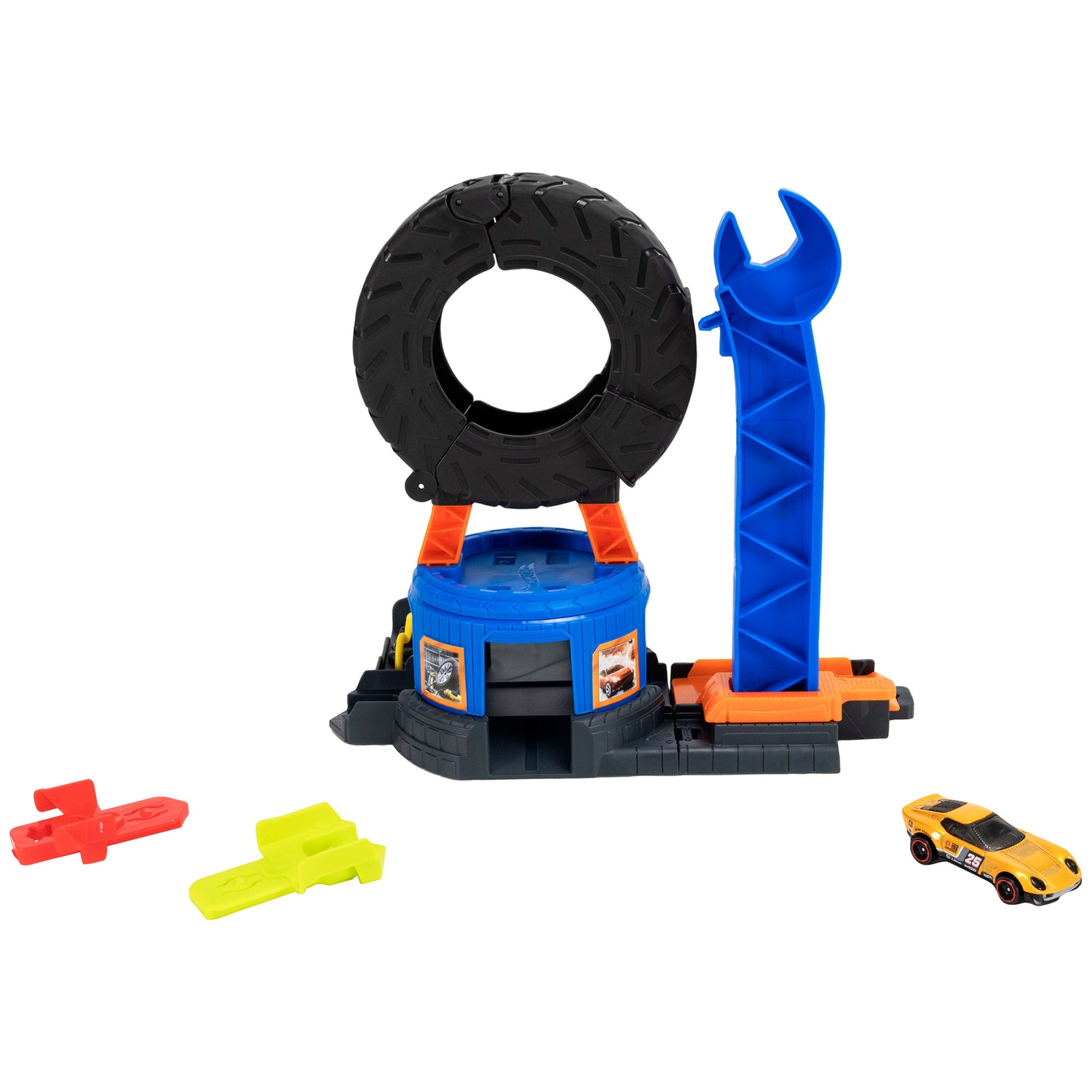 Toy playset featuring a black tire, blue wrench tower, and yellow car on a white background.