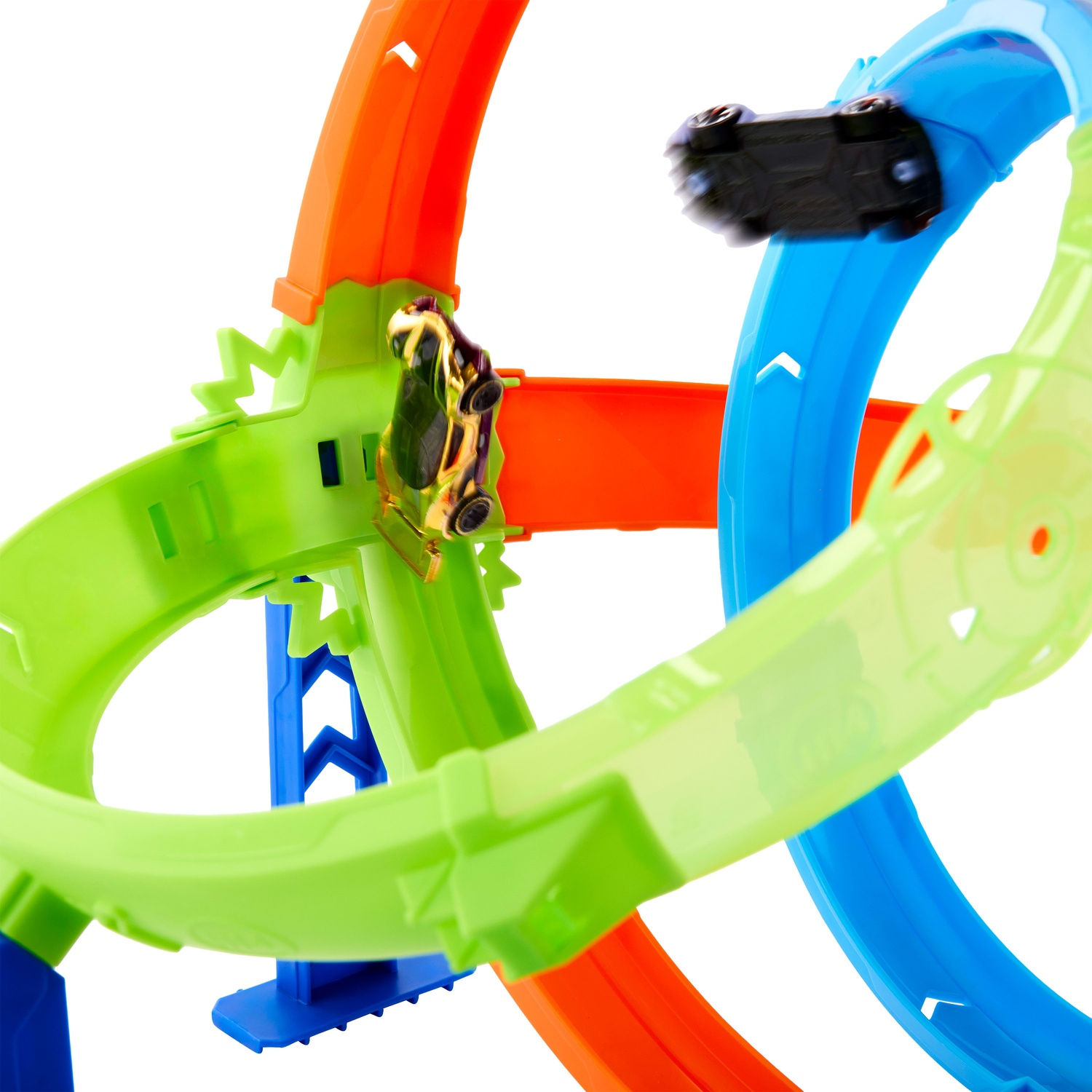 Two toy cars race along a colorful, winding plastic track.
