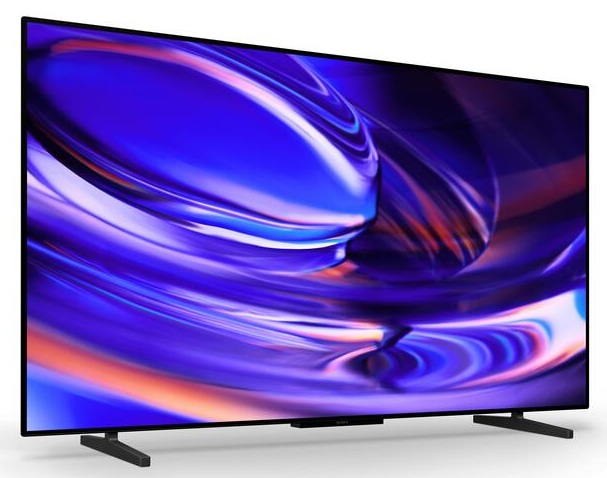 Telewizor płaskoekranowy na białym tle wyświetla abstrakcyjny, niebiesko-fioletowy wirujący wzór.