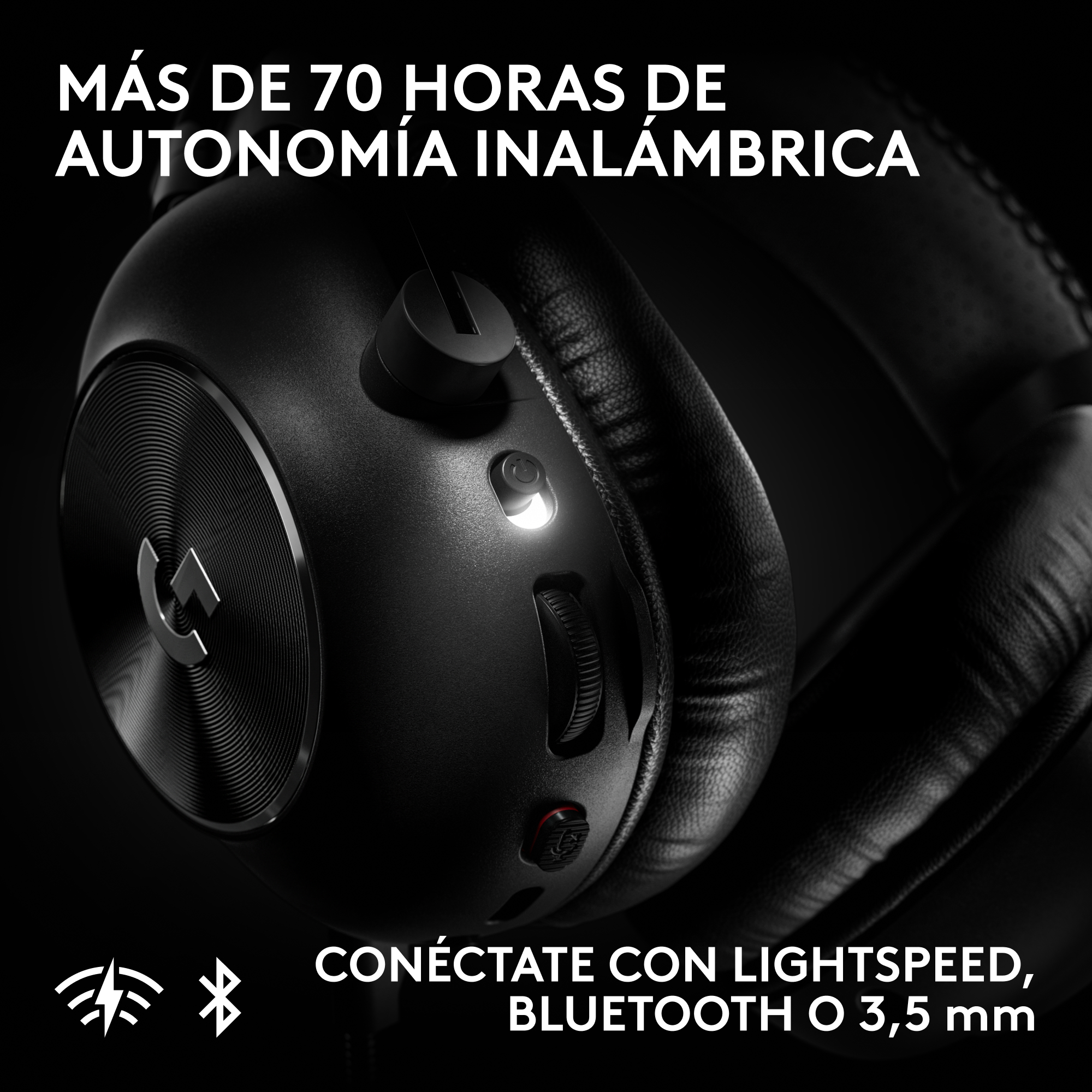 Primer plano de los controles y logotipo de unos auriculares negros sobre fondo oscuro.