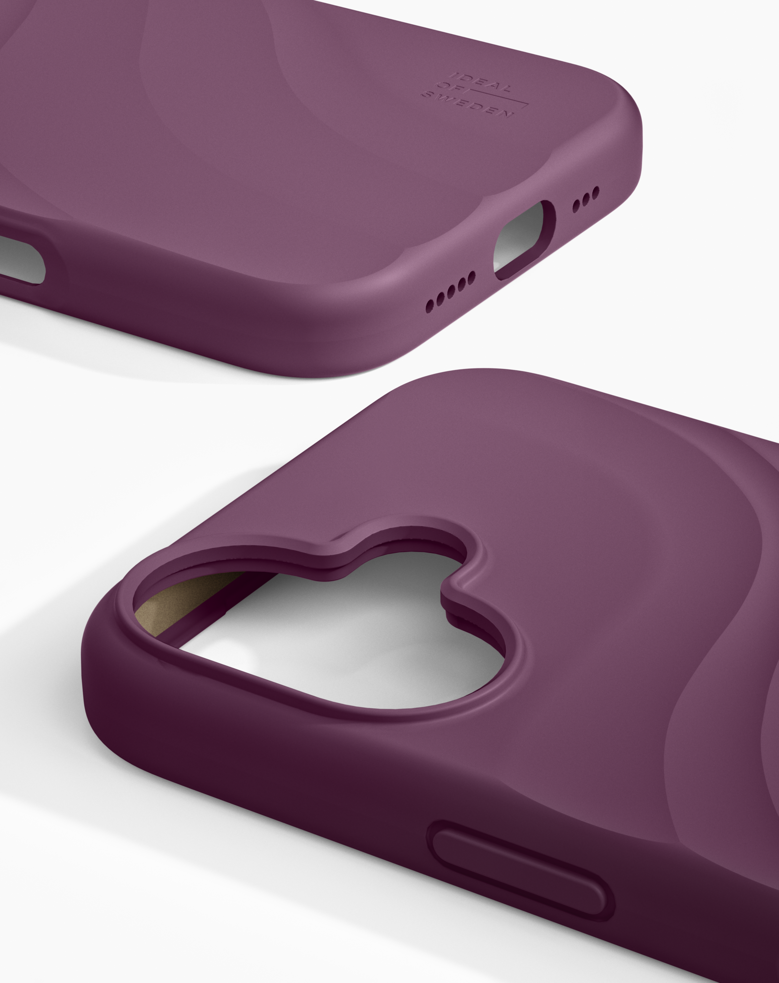Zwei matten, violetten Smartphone-Hüllen auf weißem Hintergrund, eine zeigt die Unterseite, die andere die Rückseite.