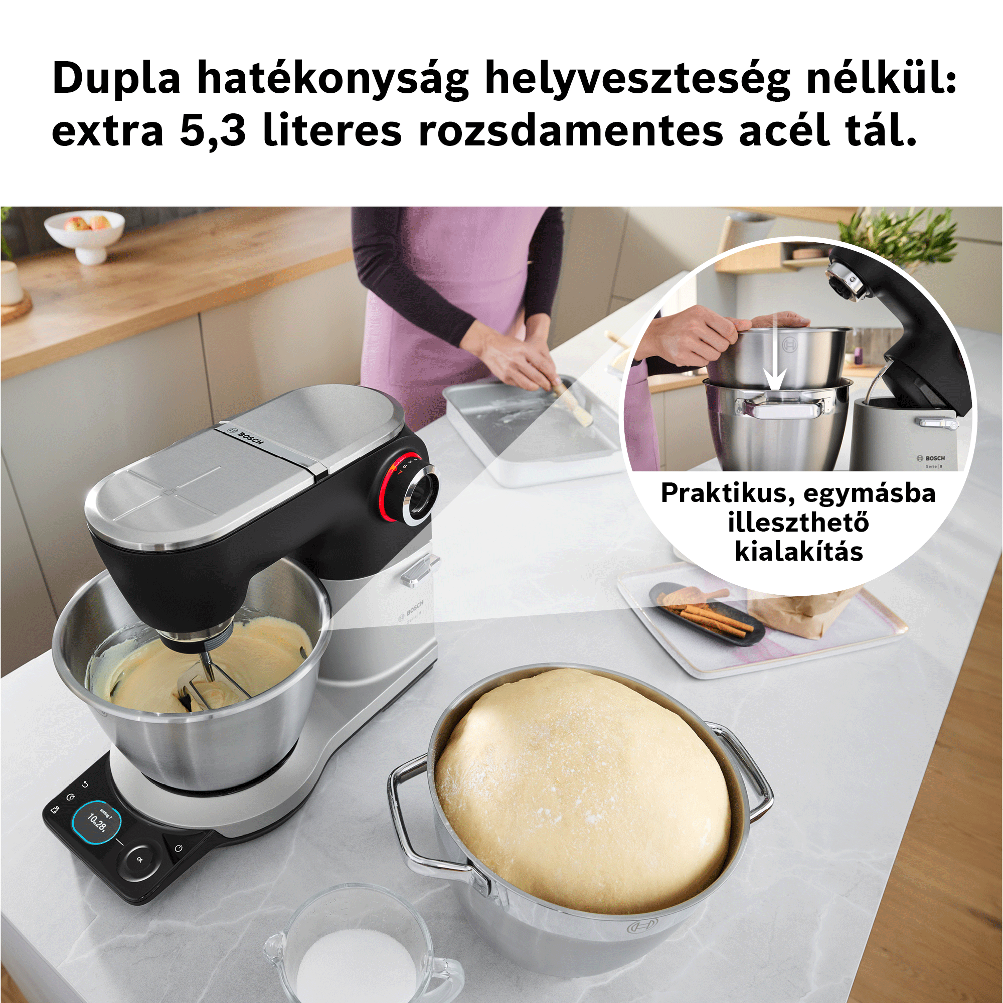 Konyhai gép nagy tállal, a konyhai munkalapon elhelyezve.