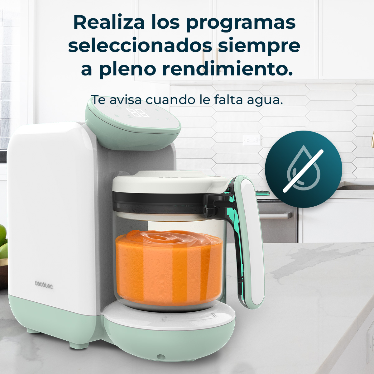 Un robot de cocina blanco y verde menta con contenido naranja en una encimera, con texto en español.